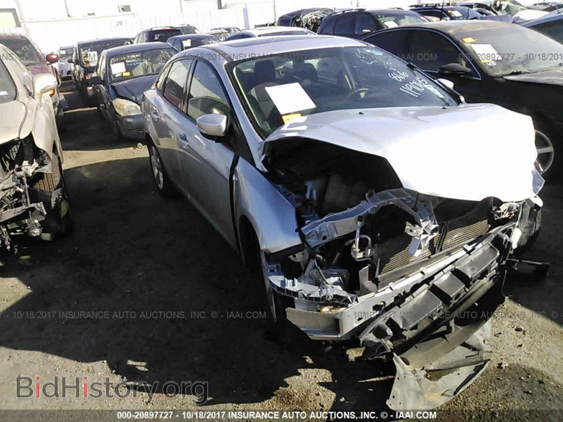 Photo 1FADP3F25EL260851 - Ford Focus 2014