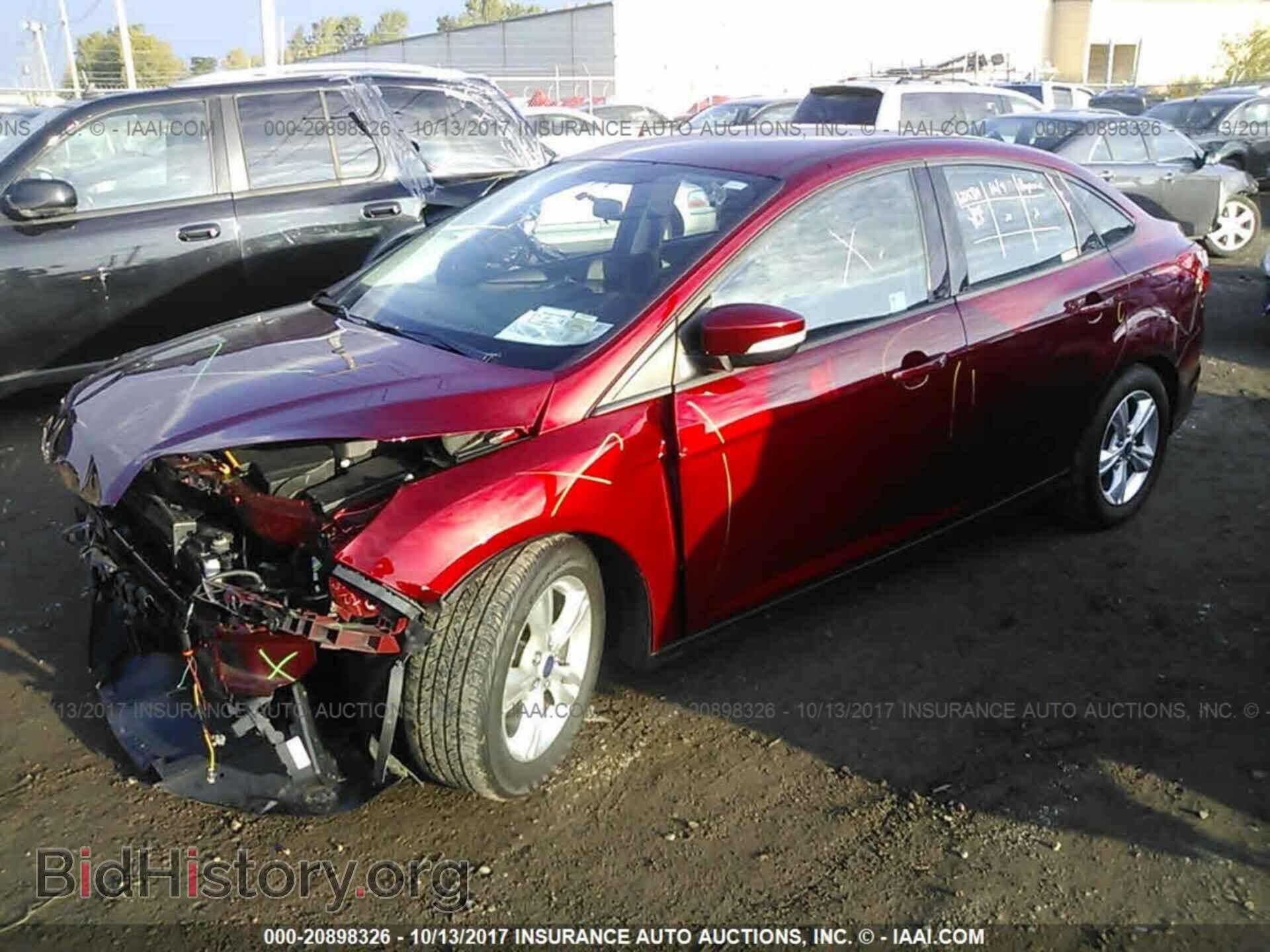 2014 Ford Focus - VIN: 1FADP3F28EL252792 - Фото 2
