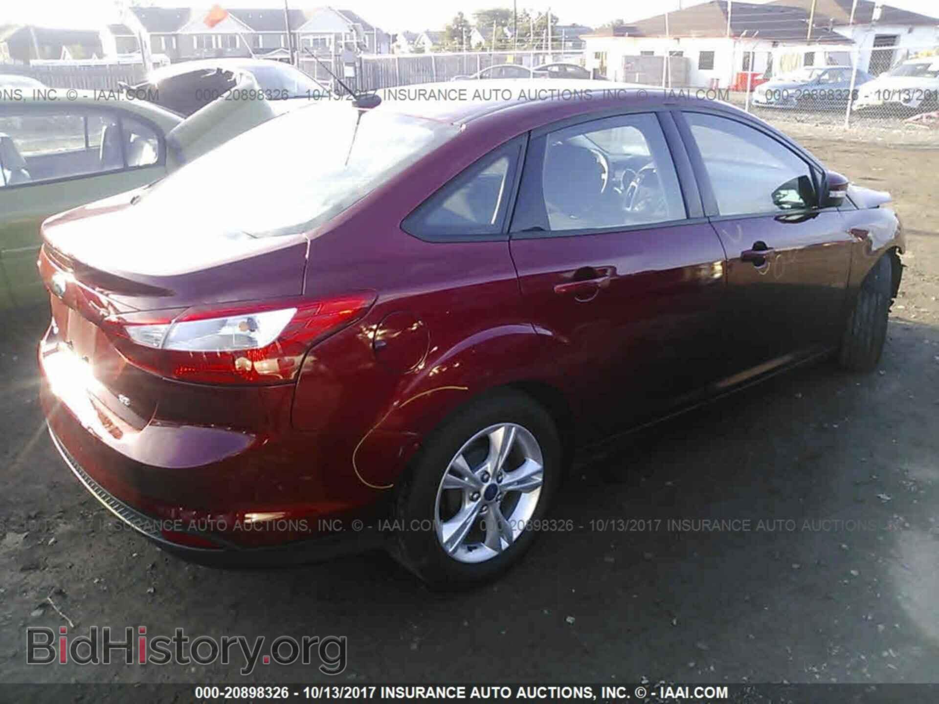 2014 Ford Focus - VIN: 1FADP3F28EL252792 - Фото 4