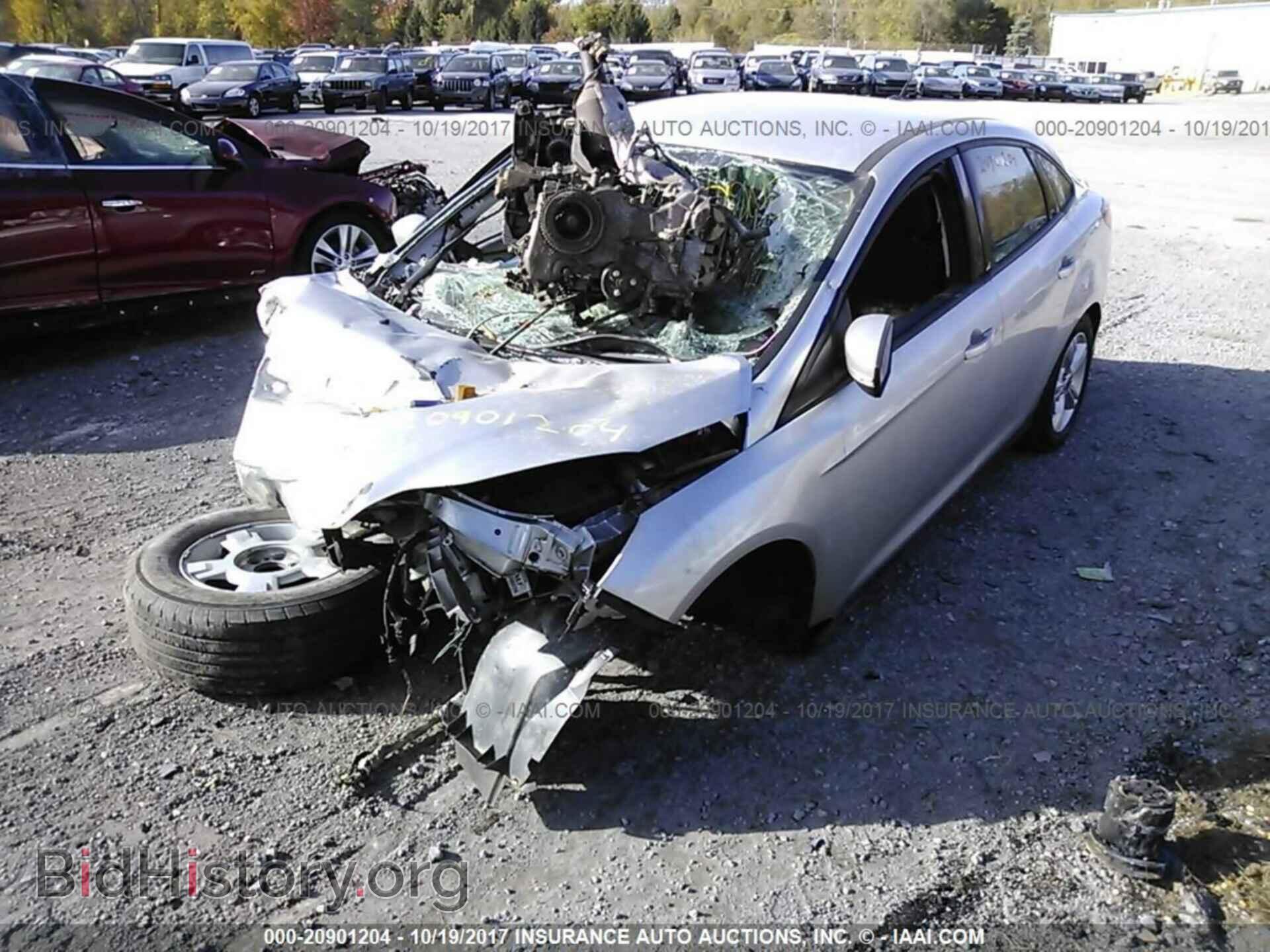 2013 Ford Focus - VIN: 1FADP3F20DL253014 - Фото 2