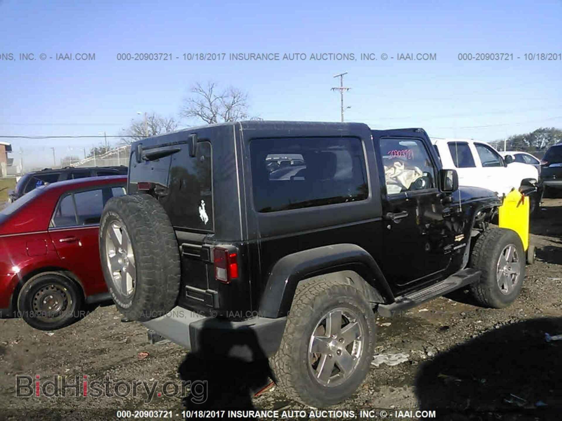2011 Jeep Wrangler - VIN: 1J4GA5D18BL632249 - Фото 4