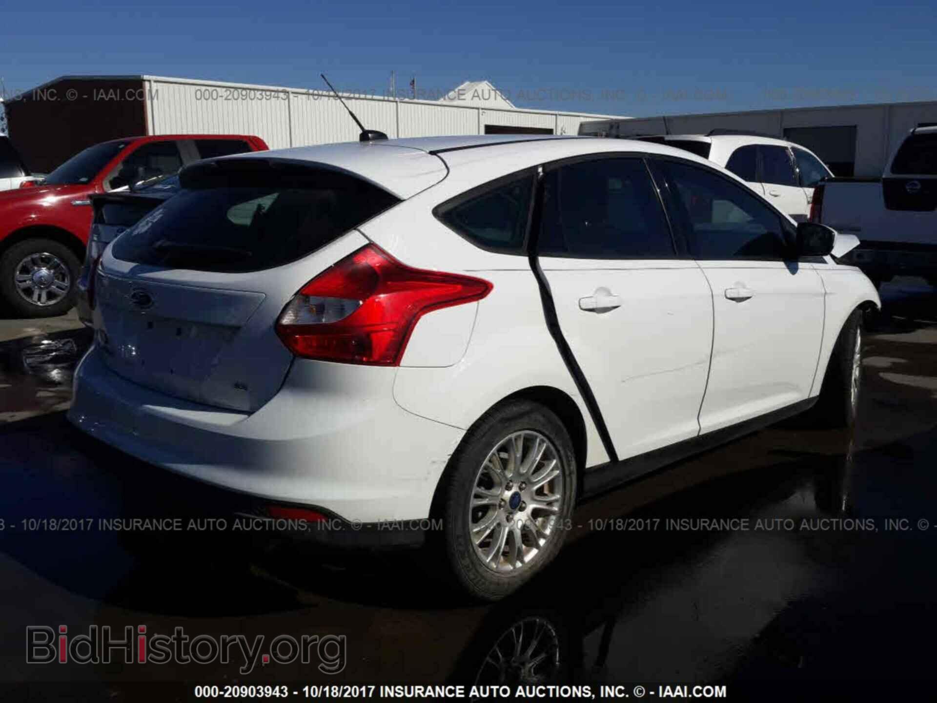 2012 Ford Focus - VIN: 1FAHP3K23CL106997 - Photo 4