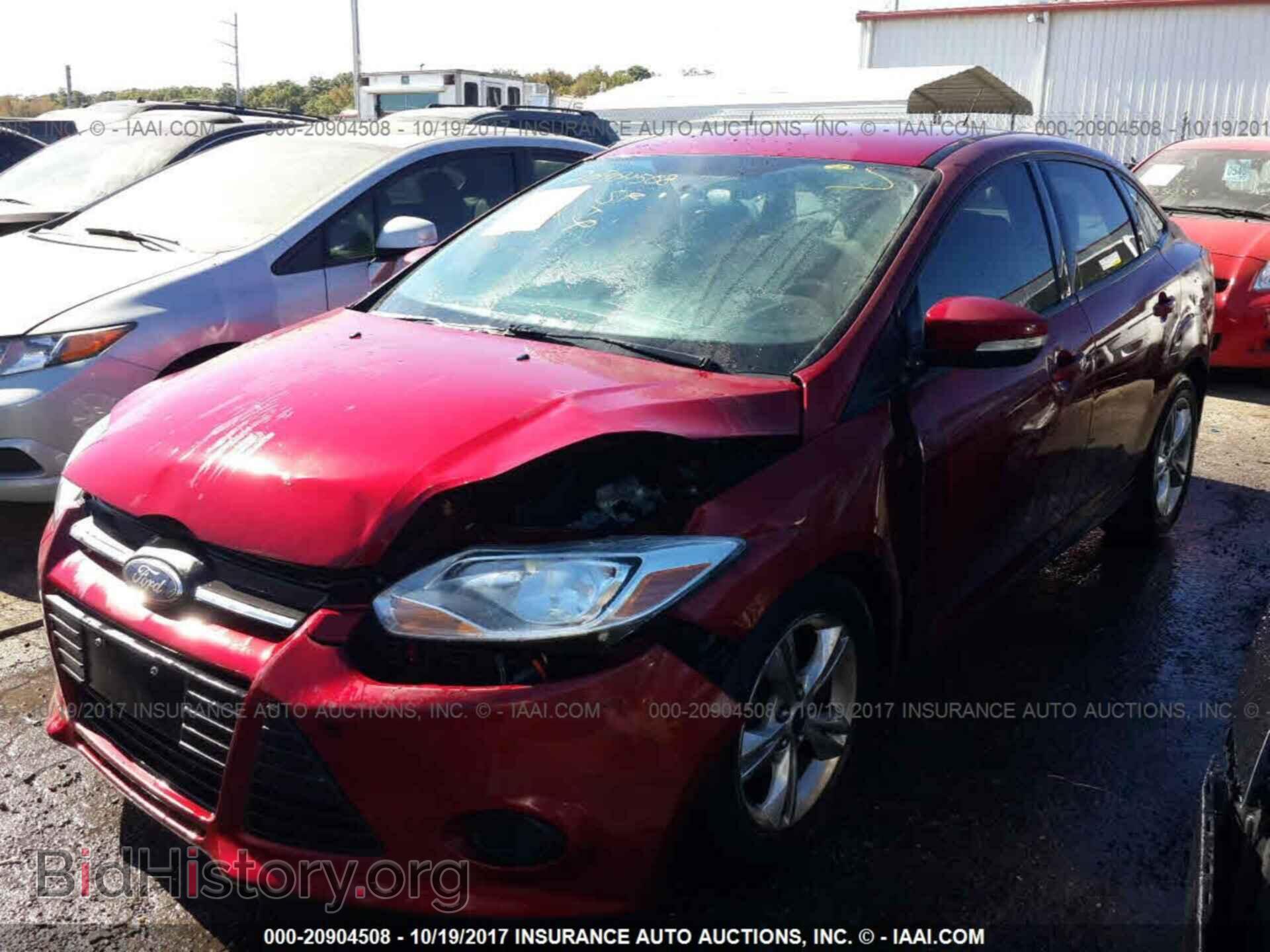 2014 Ford Focus - VIN: 1FADP3F25EL104762 - Фото 2
