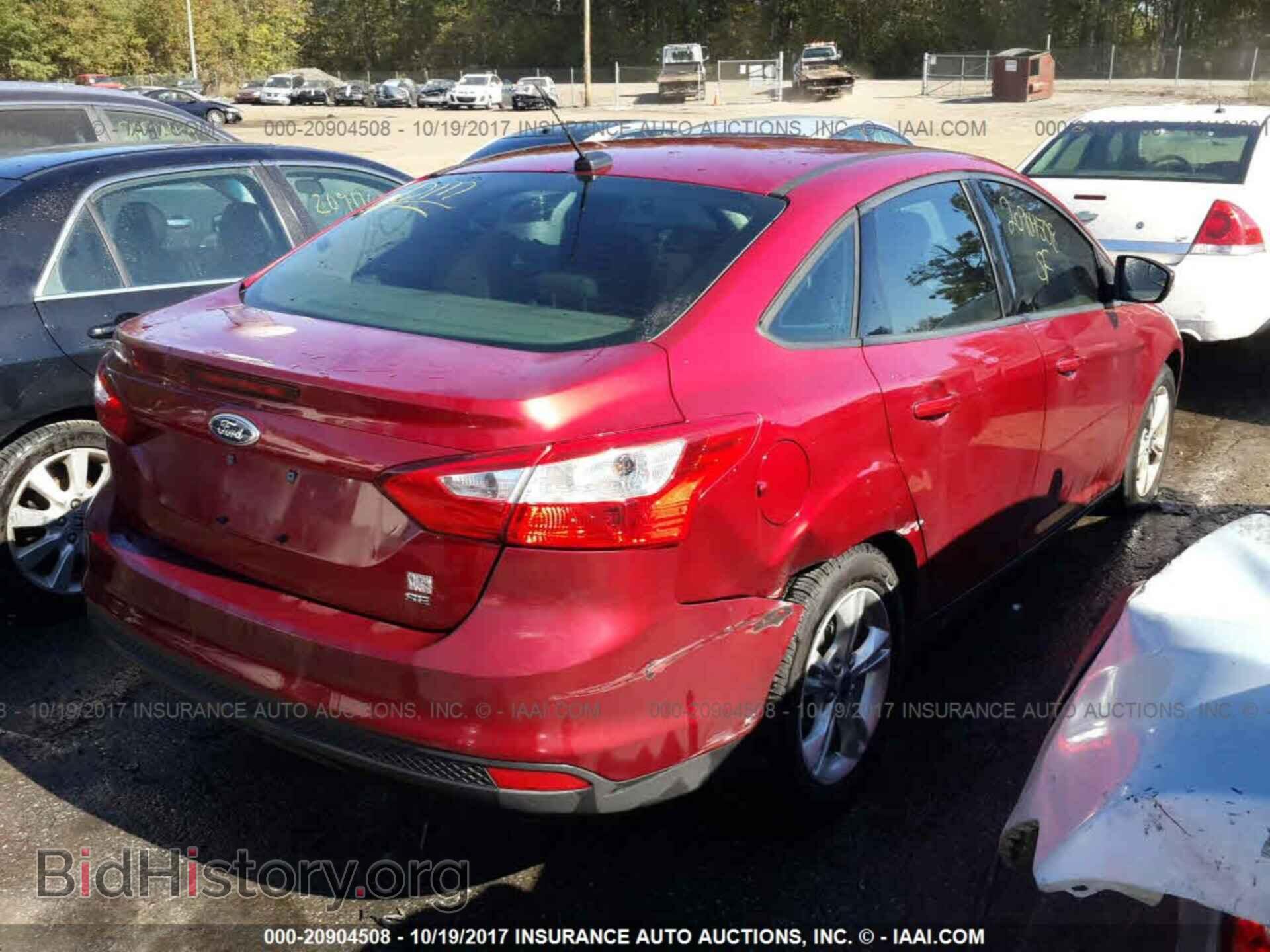 2014 Ford Focus - VIN: 1FADP3F25EL104762 - Фото 4