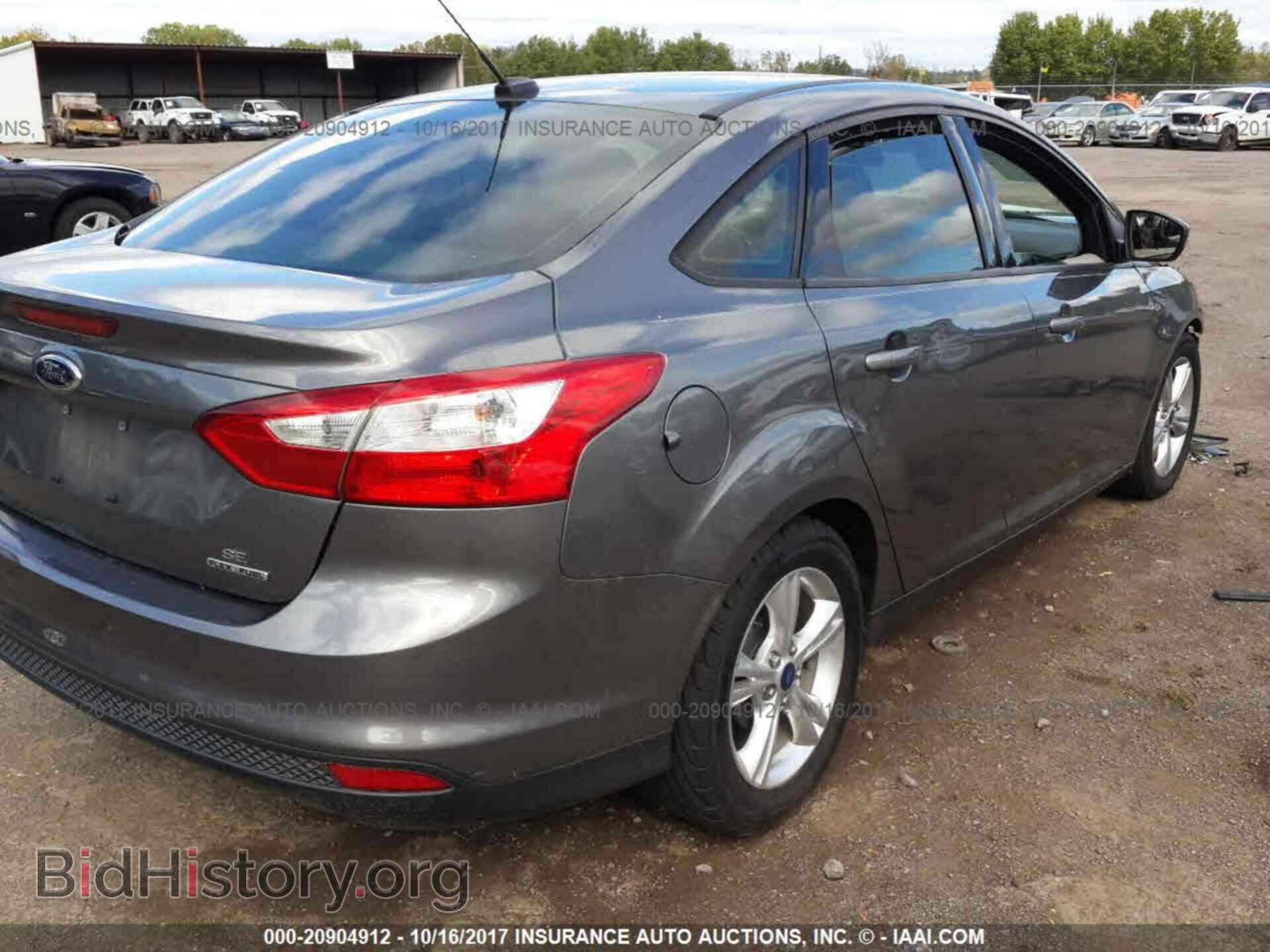 2013 Ford Focus - VIN: 1FADP3F29DL203647 - Photo 4