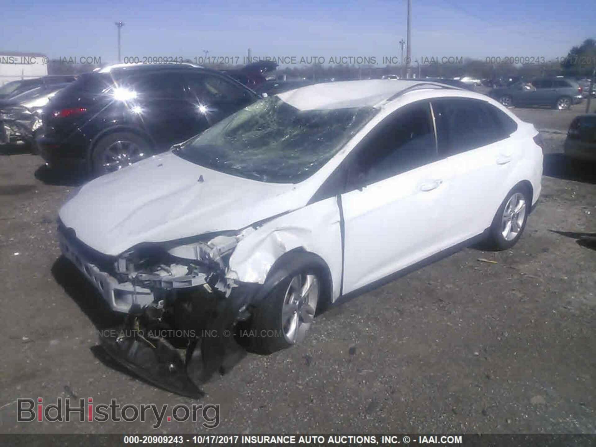 2014 Ford Focus - VIN: 1FADP3F29EL205349 - Фото 2