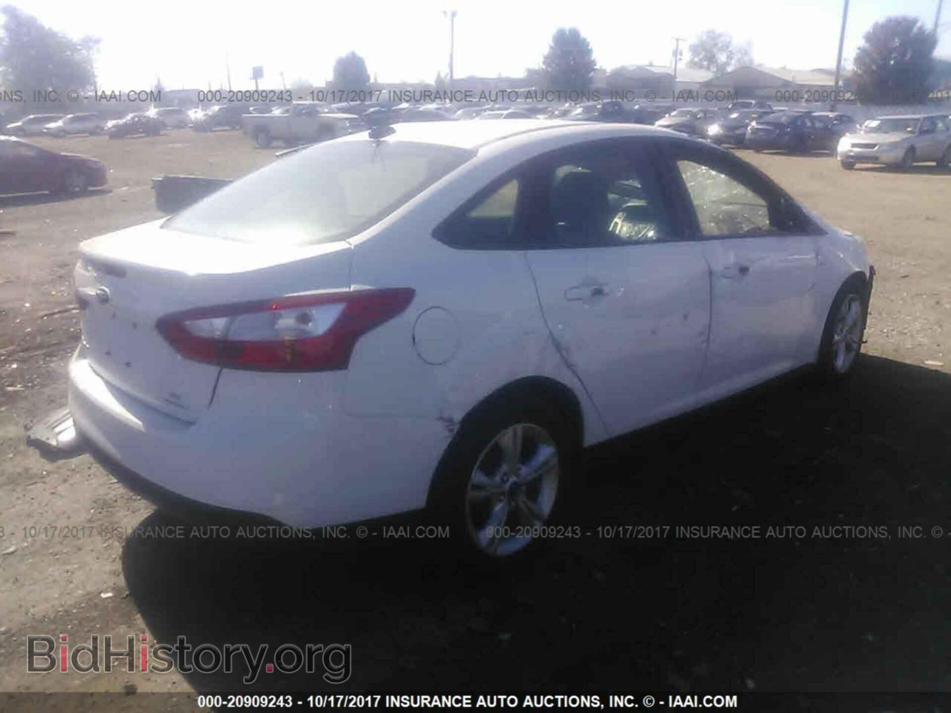 2014 Ford Focus - VIN: 1FADP3F29EL205349 - Фото 4
