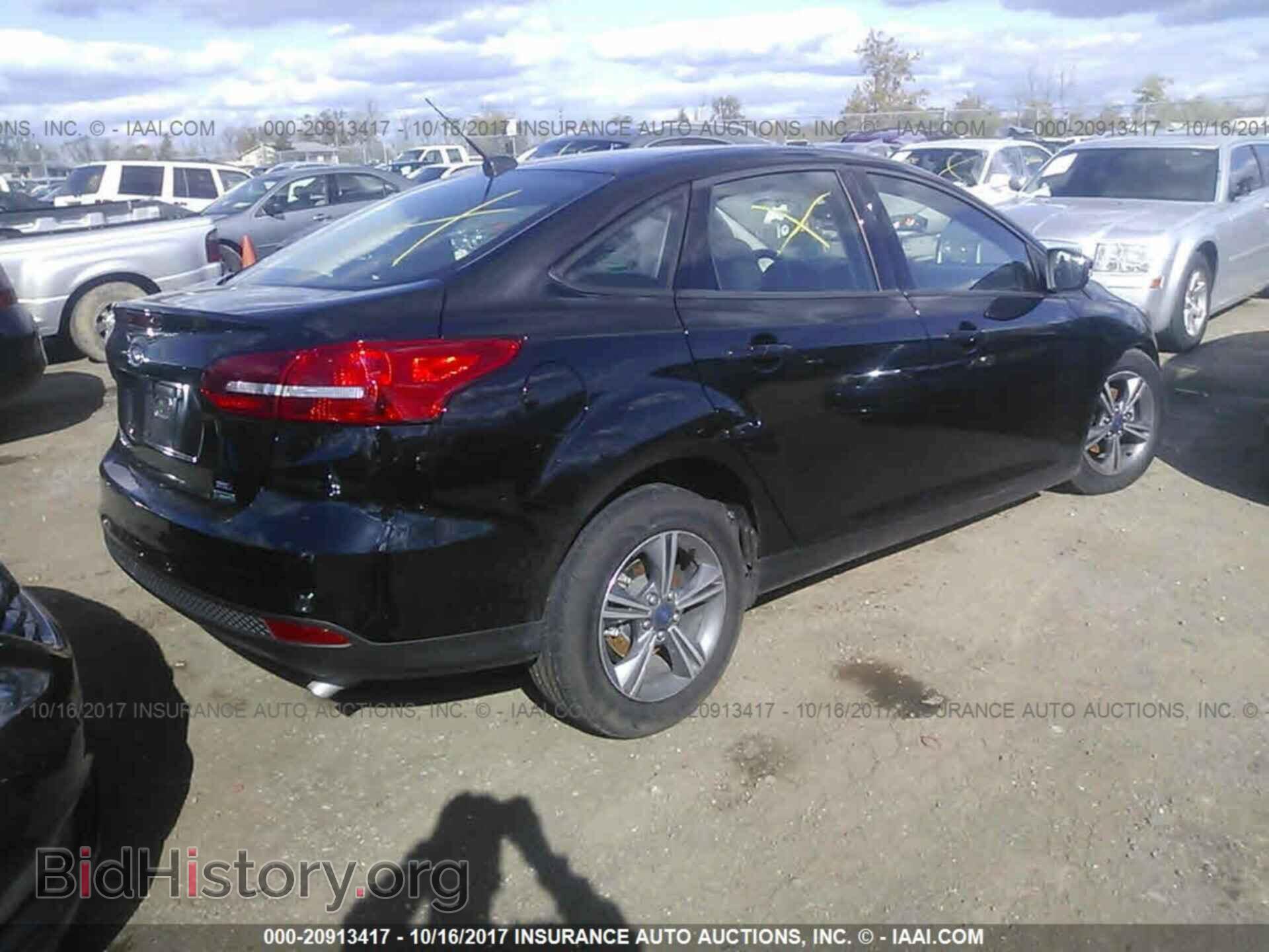 2017 Ford Focus - VIN: 1FADP3FE1HL289844 - Photo 4