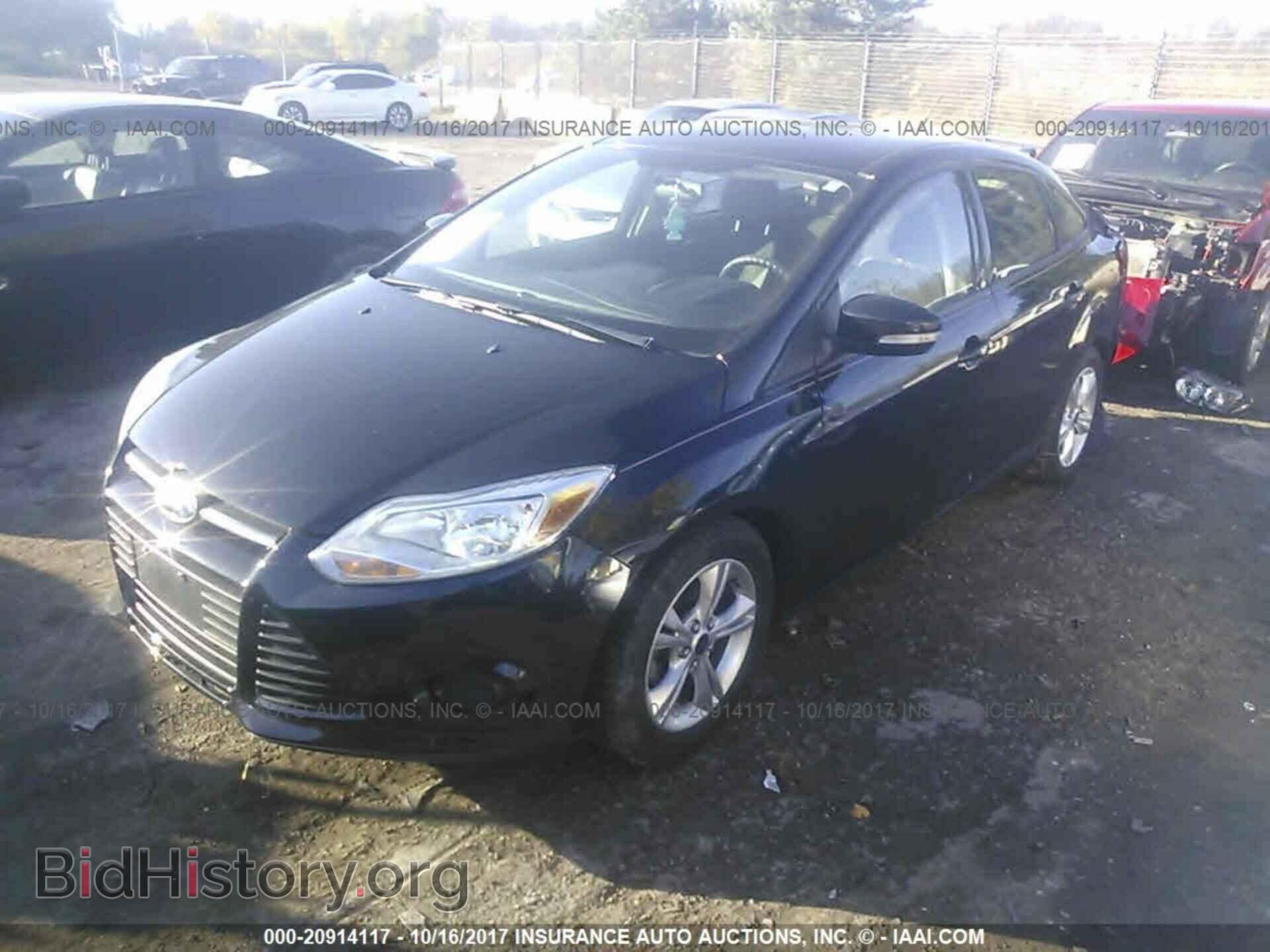 2014 Ford Focus - VIN: 1FADP3F23EL262159 - Photo 2