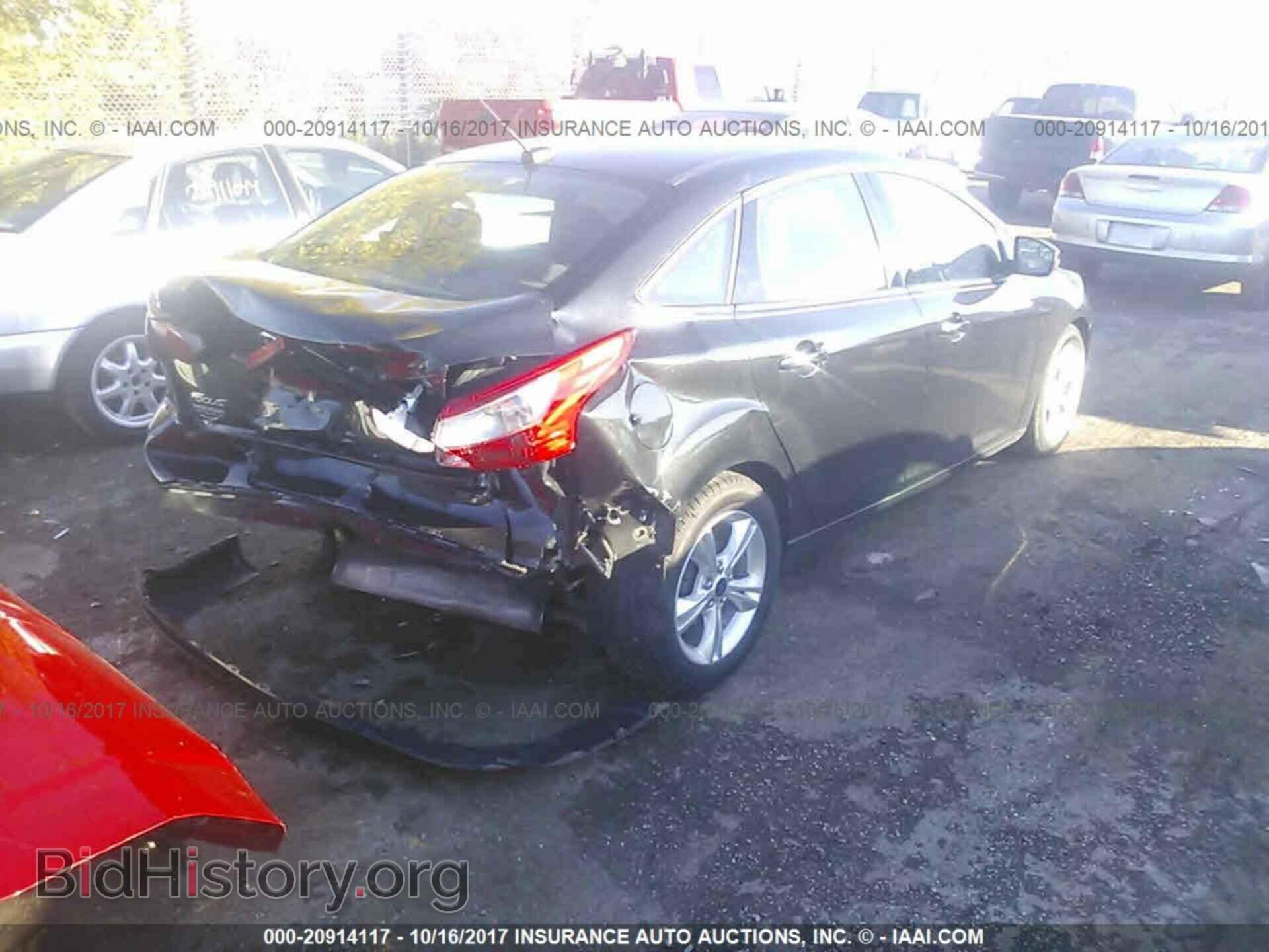 2014 Ford Focus - VIN: 1FADP3F23EL262159 - Photo 4