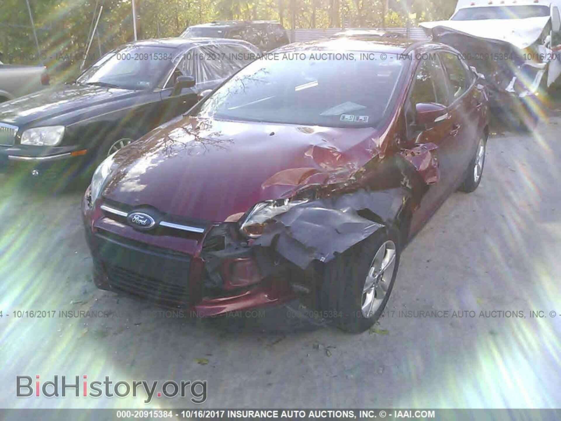 2014 Ford Focus - VIN: 1FADP3F24EL258427 - Photo 2