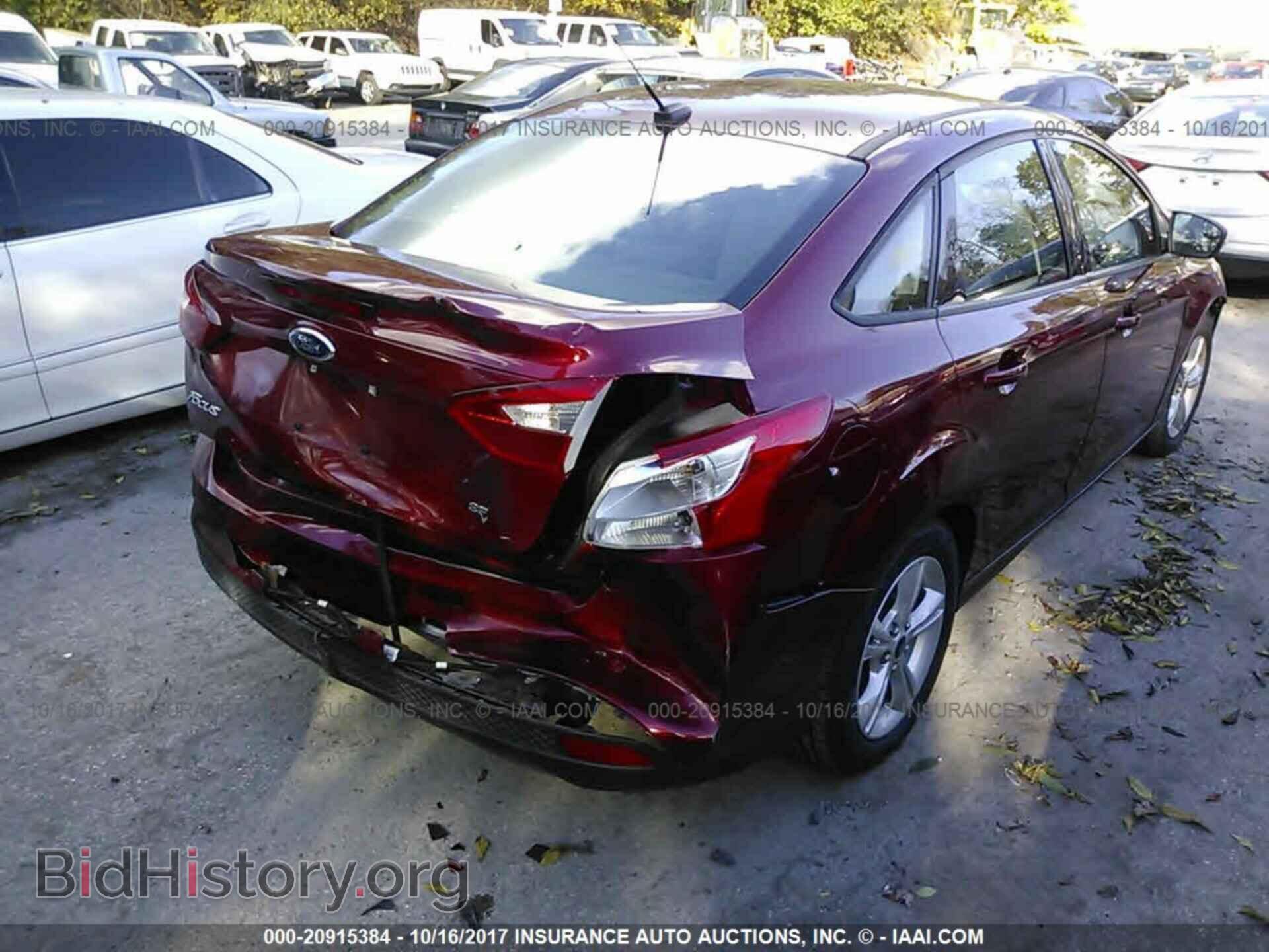 2014 Ford Focus - VIN: 1FADP3F24EL258427 - Photo 4