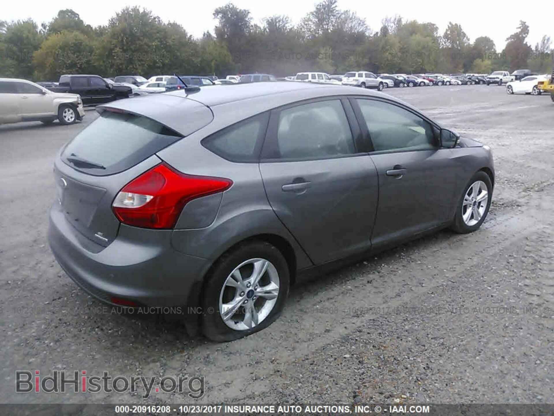 2014 Ford Focus - VIN: 1FADP3K29EL203624 - Фото 4