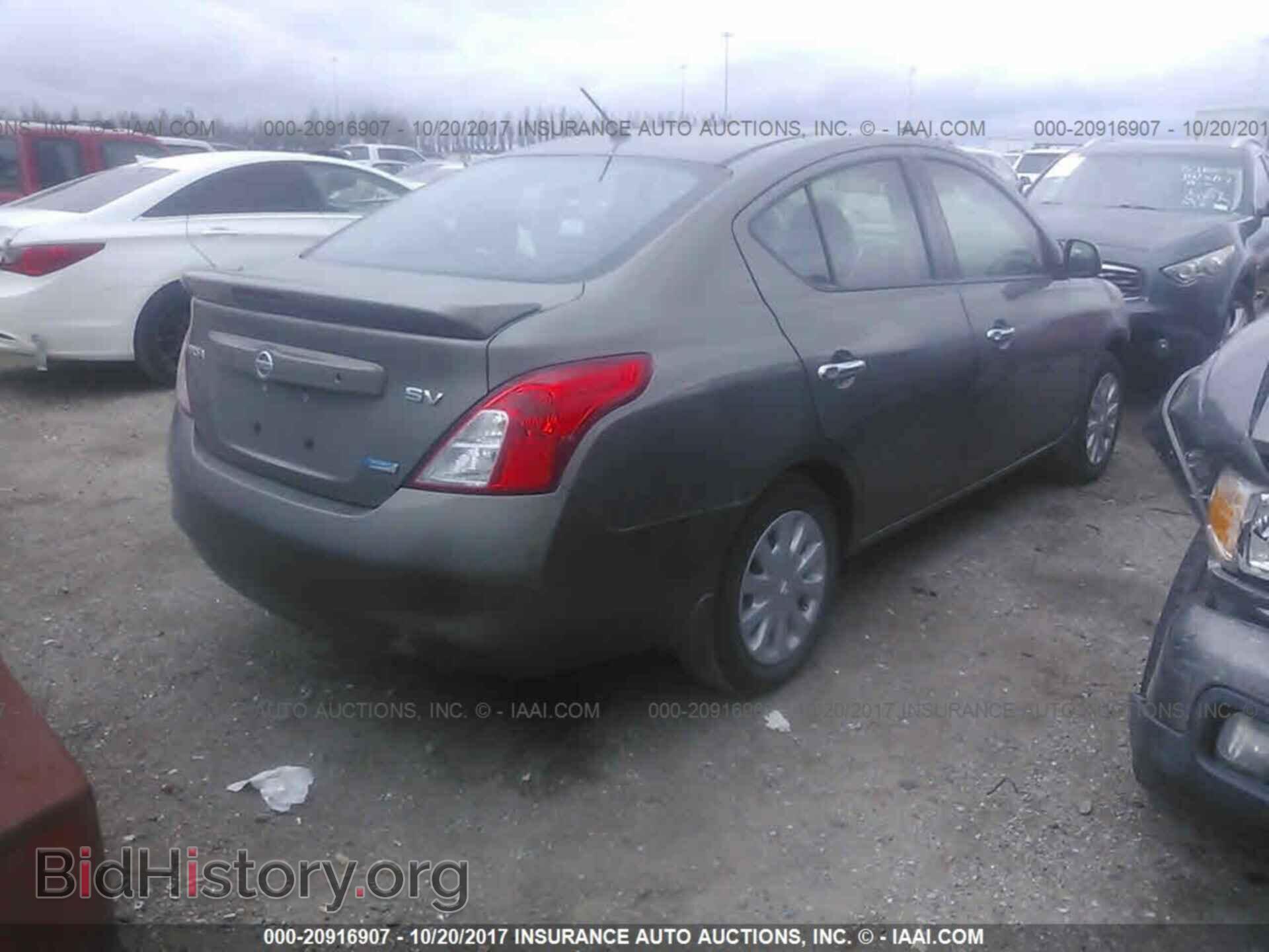 2014 Nissan Versa - VIN: 3N1CN7AP1EK461181 - Фото 4