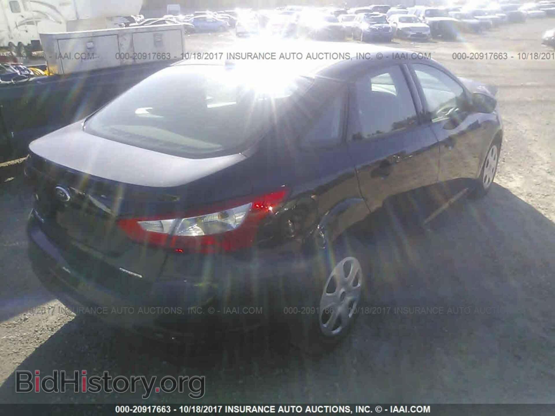 2014 Ford Focus - VIN: 1FADP3E22EL404082 - Photo 4