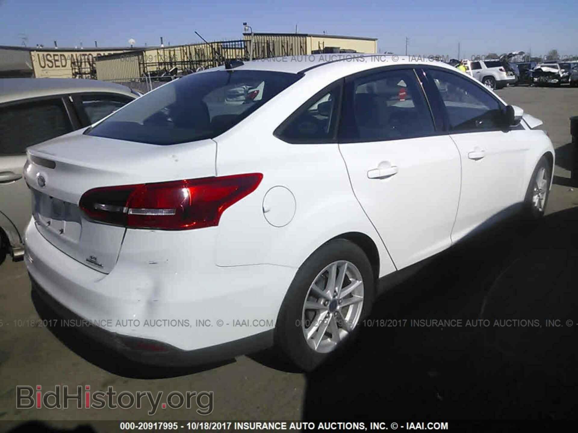 2015 Ford Focus - VIN: 1FADP3F24FL243783 - Photo 4