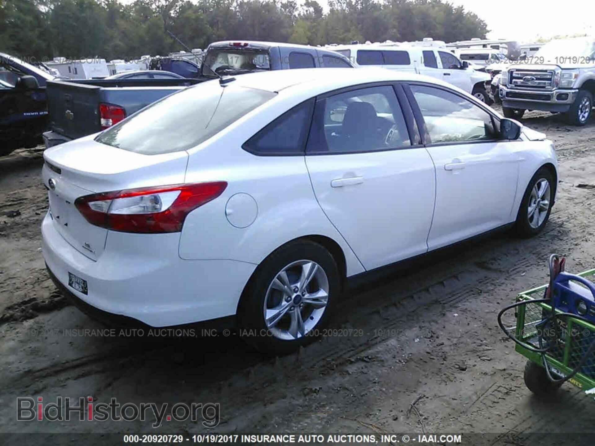 2014 Ford Focus - VIN: 1FADP3F23EL248889 - Photo 4