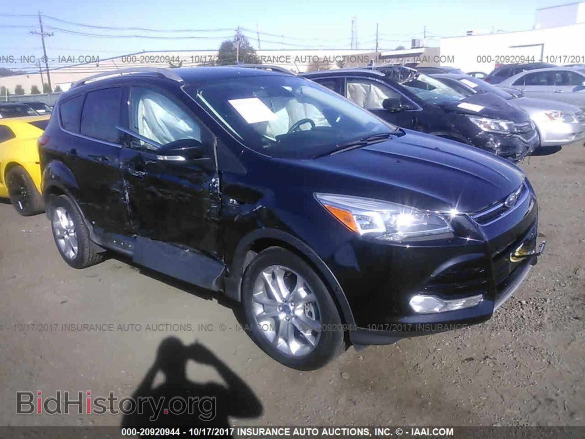 Фотография 1FMCU9JX1EUD35409 - Ford Escape 2014