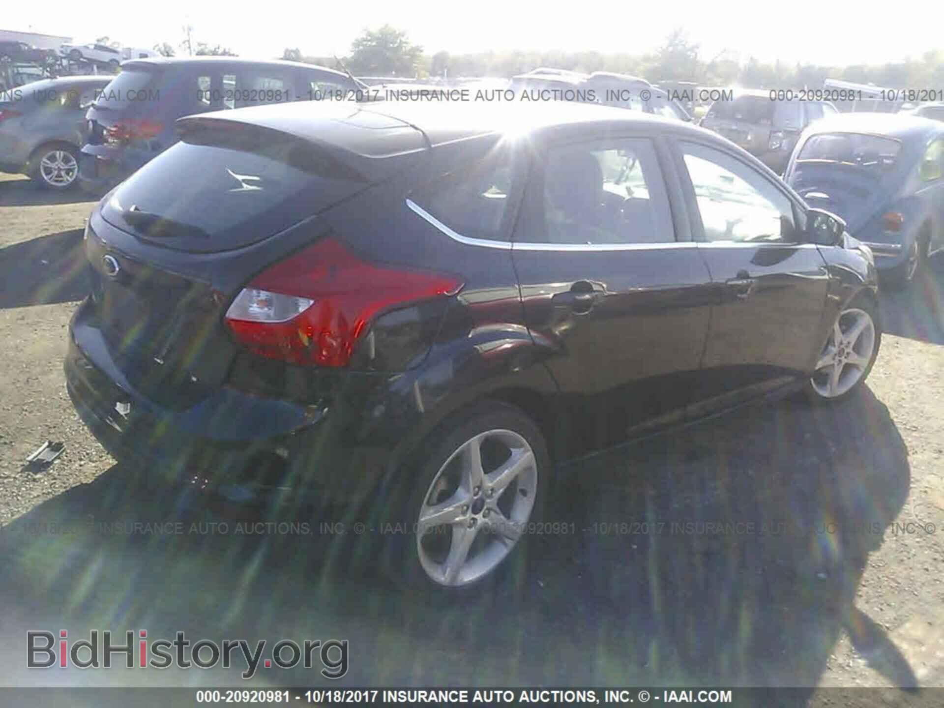 2014 Ford Focus - VIN: 1FADP3N25EL463157 - Фото 4