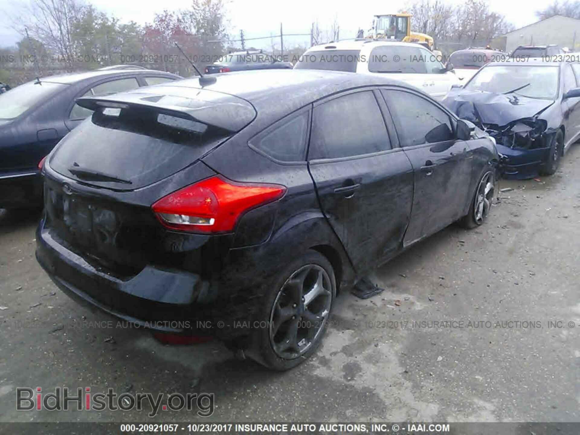 2016 Ford Focus - VIN: 1FADP3L9XGL358004 - Photo 4
