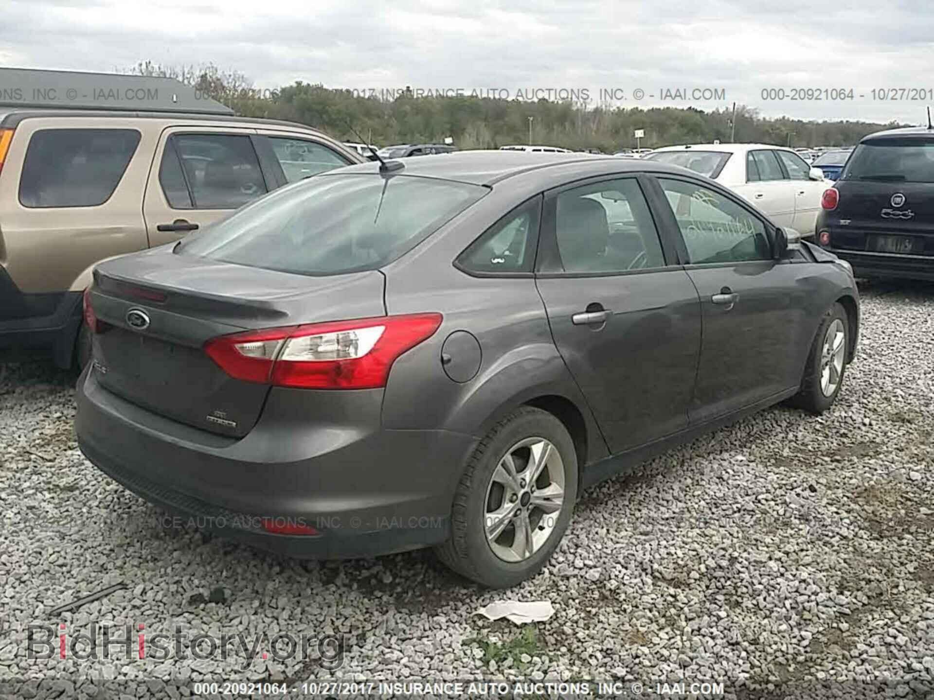2013 Ford Focus - VIN: 1FADP3F24DL350734 - Photo 4
