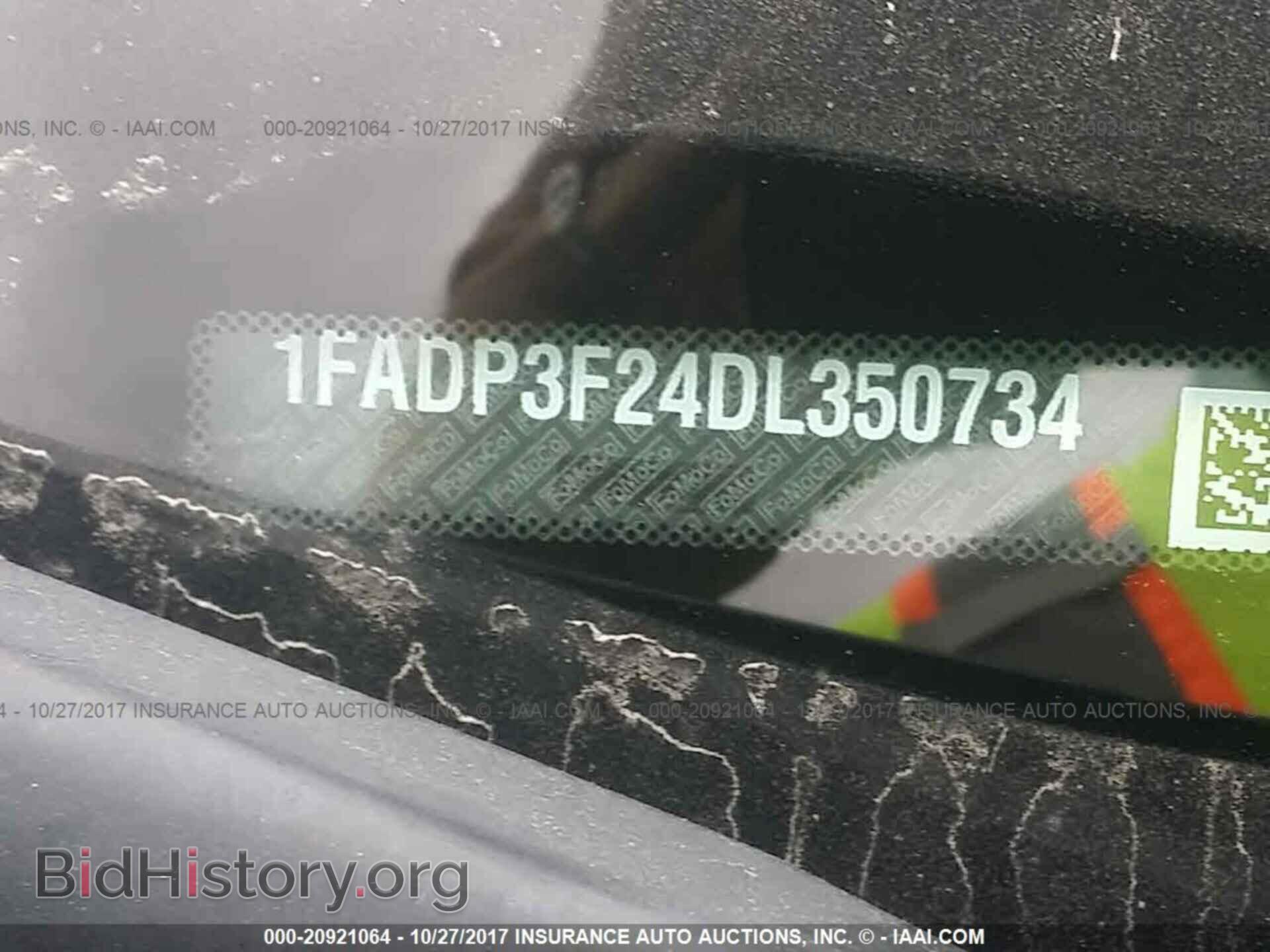 2013 Ford Focus - VIN: 1FADP3F24DL350734 - Photo 9