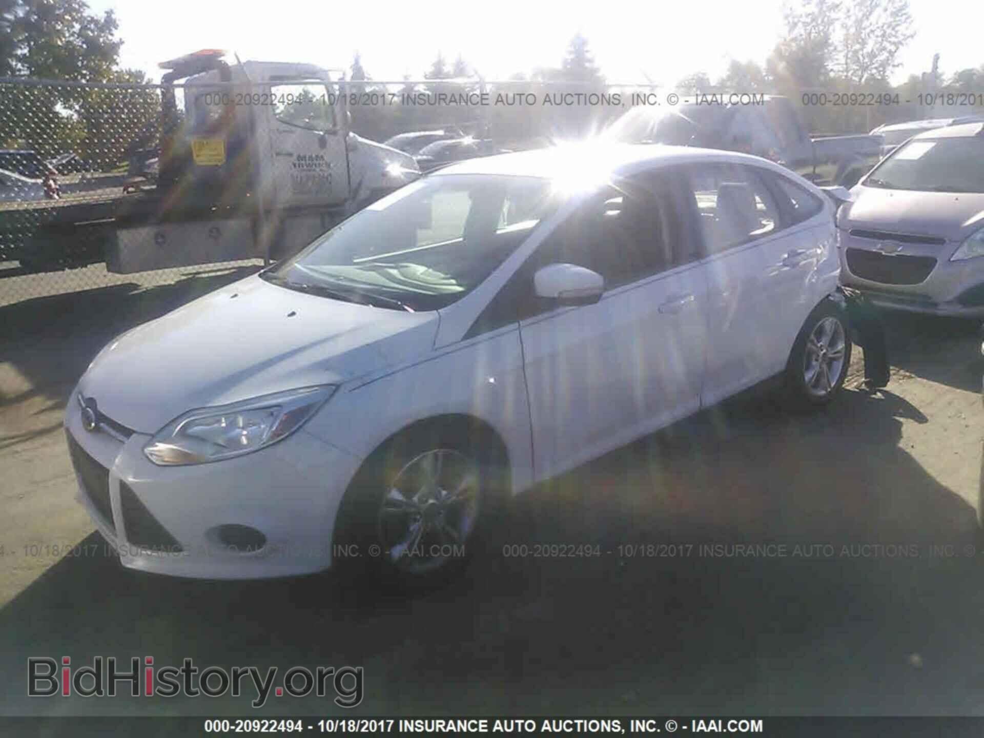 2014 Ford Focus - VIN: 1FADP3F27EL253447 - Photo 2