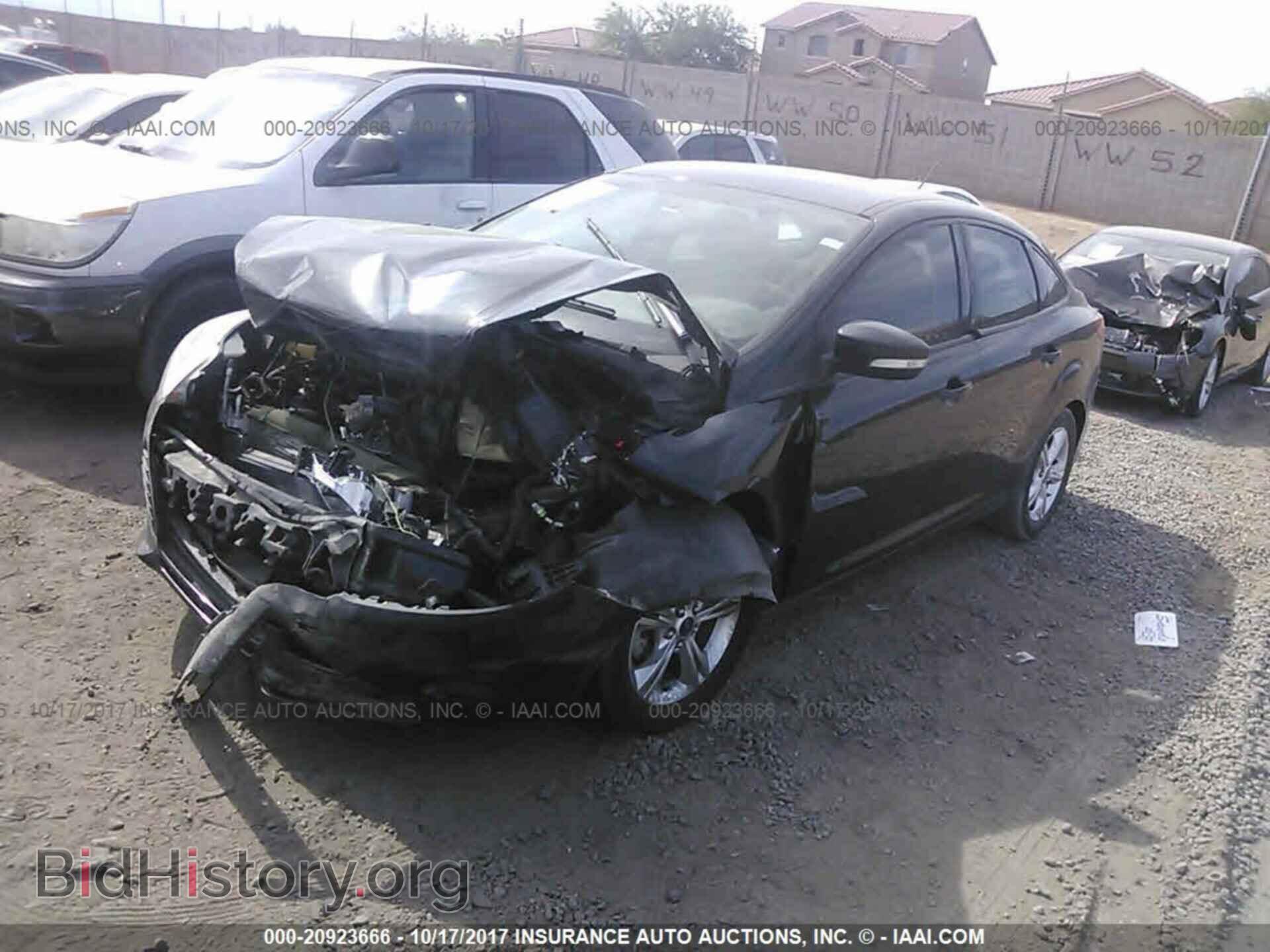 2014 Ford Focus - VIN: 1FADP3F20EL149138 - Фото 2