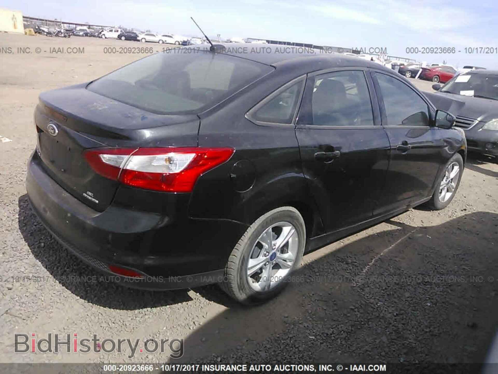 2014 Ford Focus - VIN: 1FADP3F20EL149138 - Фото 4