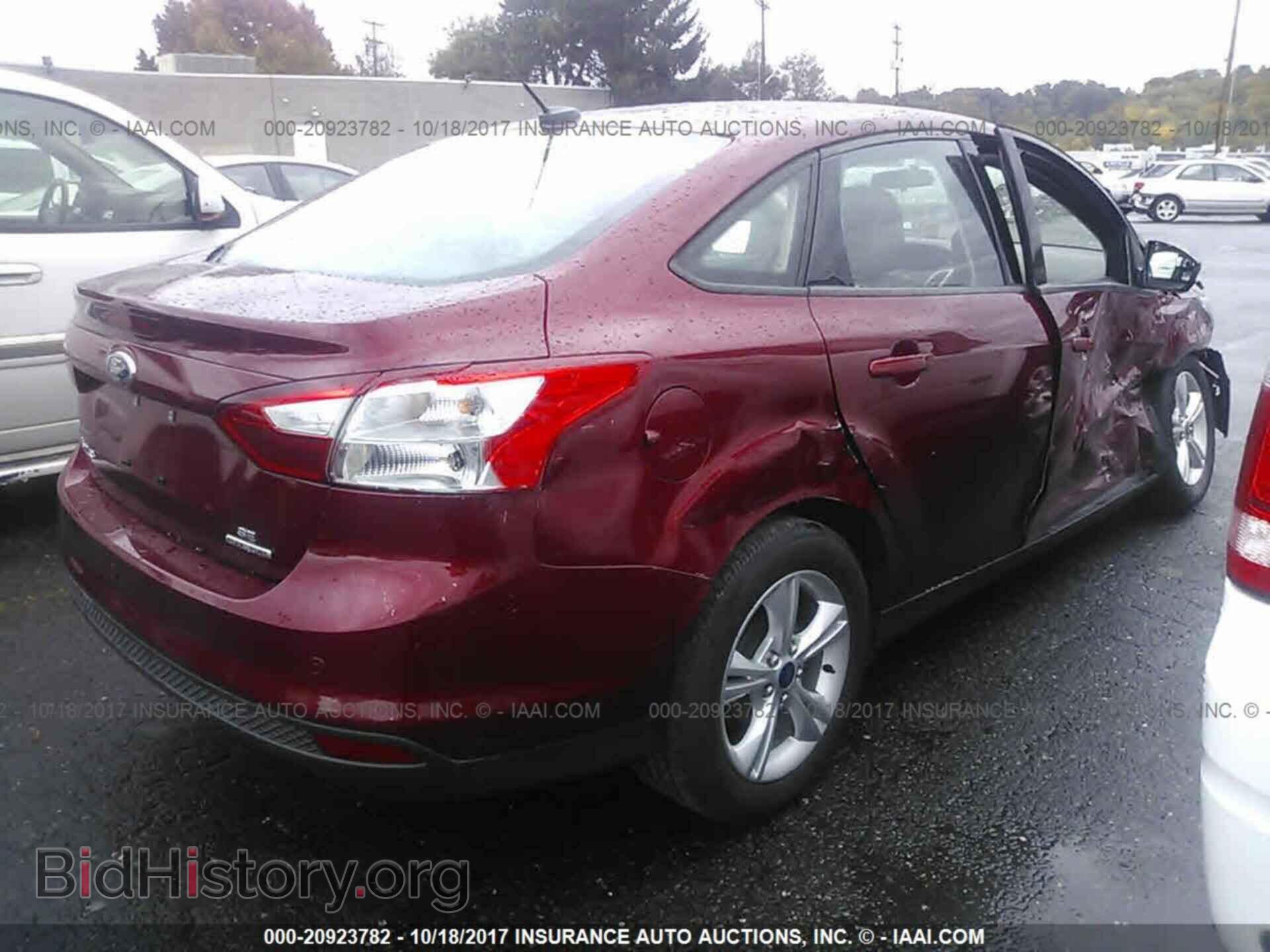 2014 Ford Focus - VIN: 1FADP3F25EL225095 - Фото 4