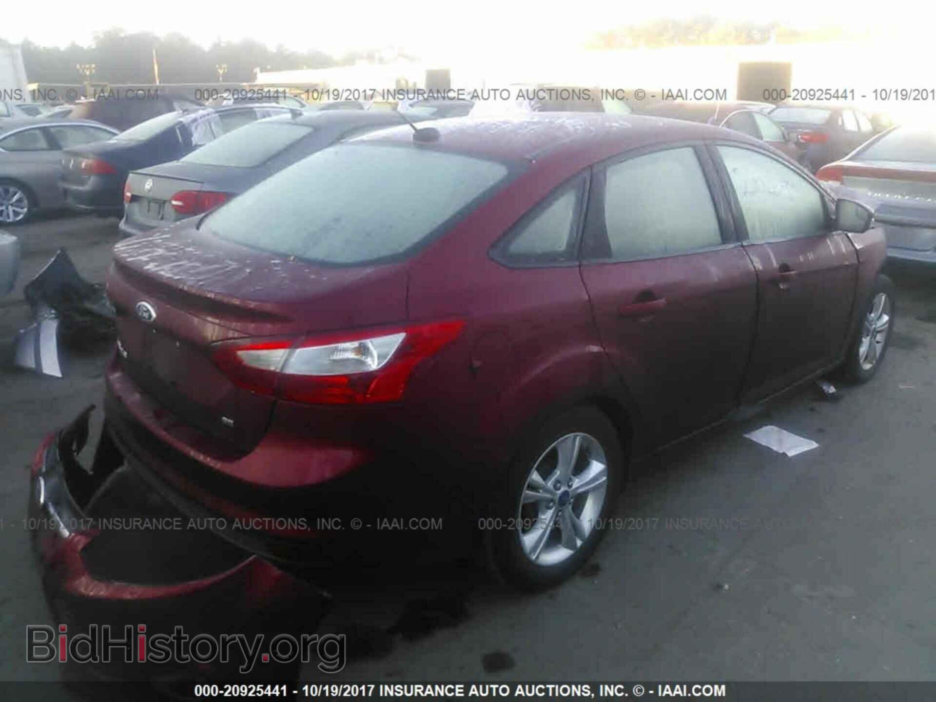 2014 Ford Focus - VIN: 1FADP3F28EL315728 - Photo 4