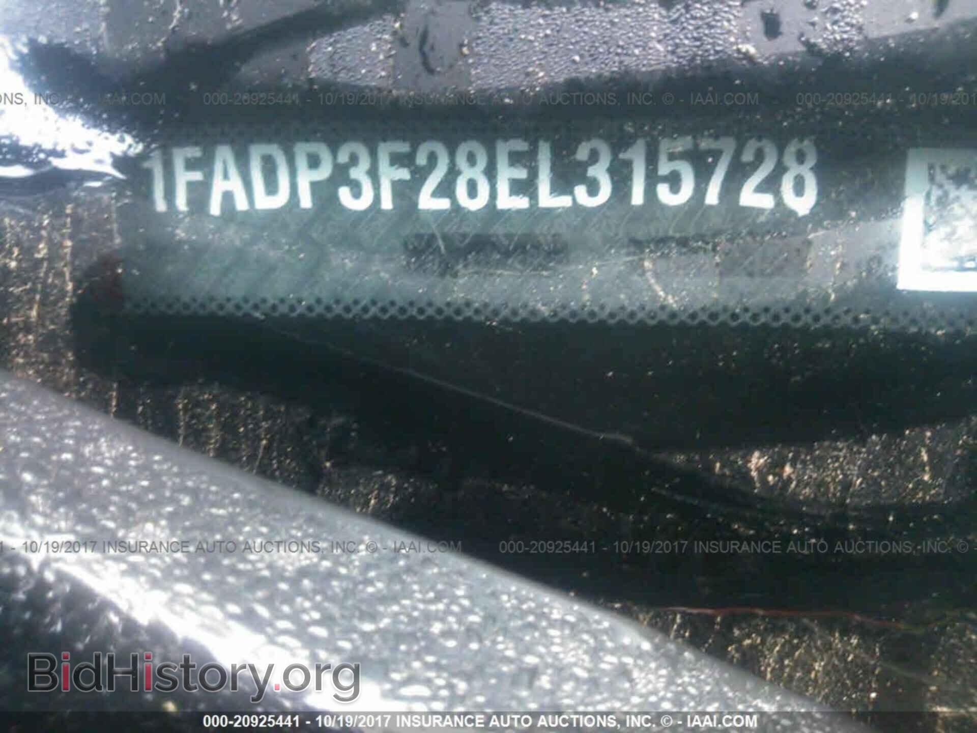 2014 Ford Focus - VIN: 1FADP3F28EL315728 - Photo 9
