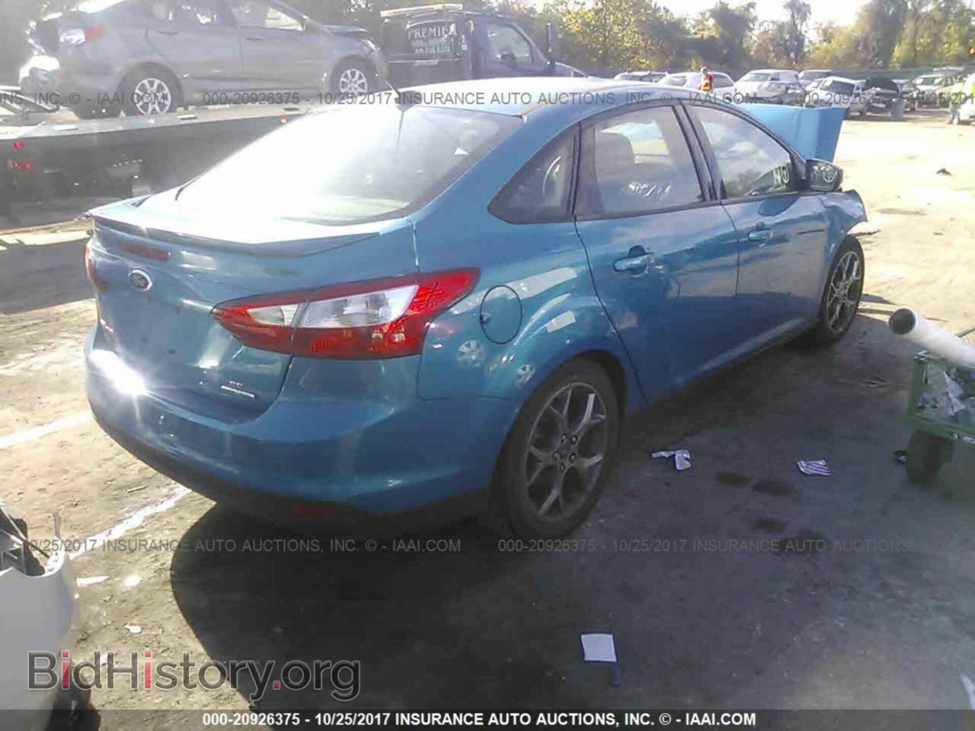 2014 Ford Focus - VIN: 1FADP3F29EL136923 - Photo 4