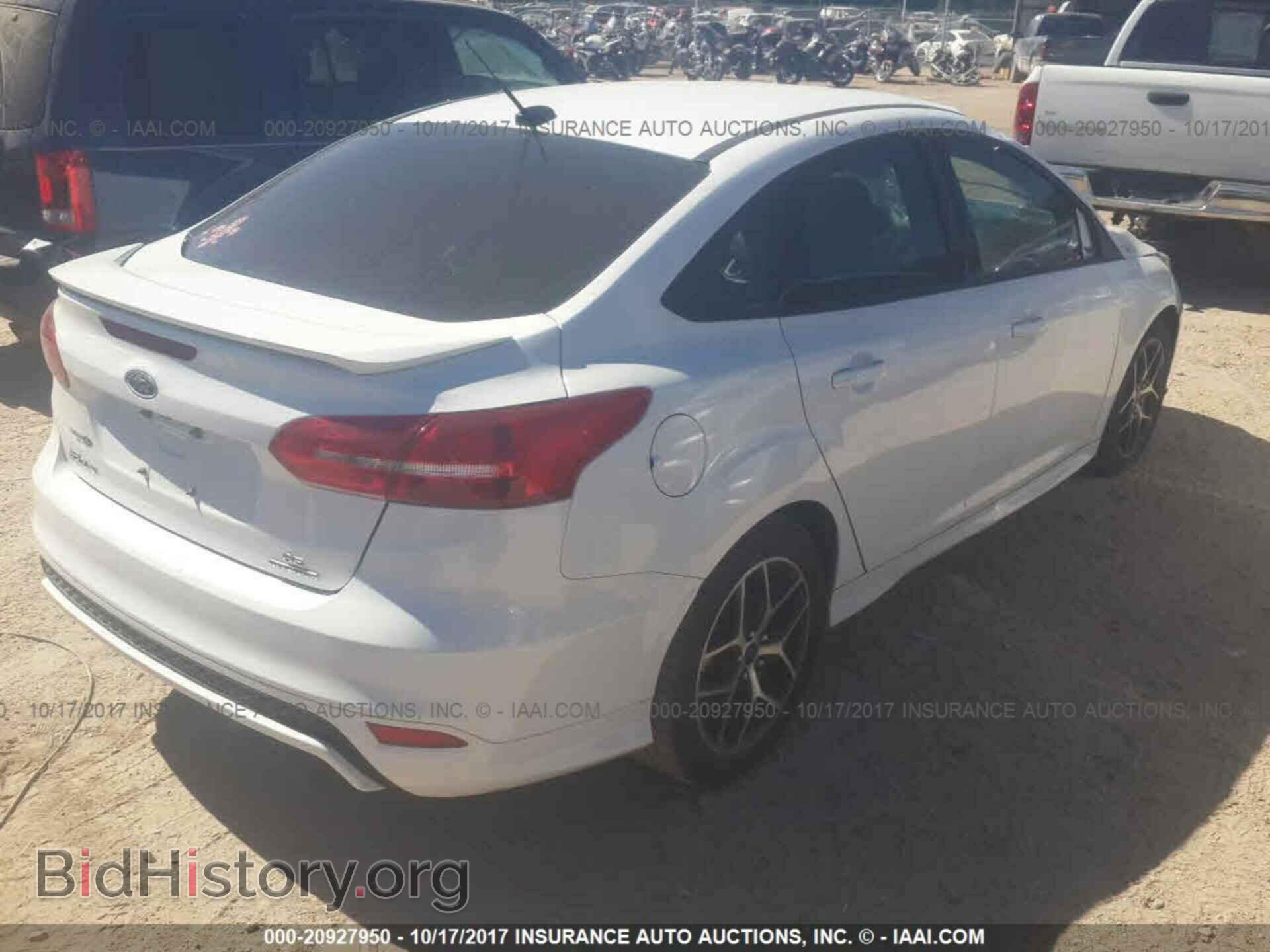 2015 Ford Focus - VIN: 1FADP3F27FL291990 - Photo 4