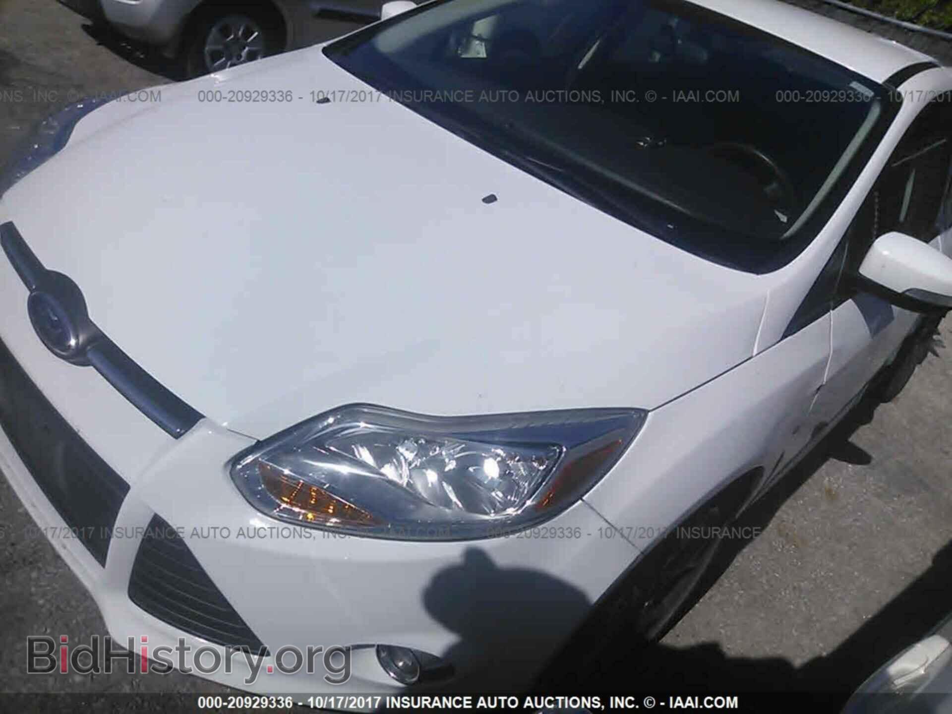 2014 Ford Focus - VIN: 1FADP3F22EL406638 - Photo 2