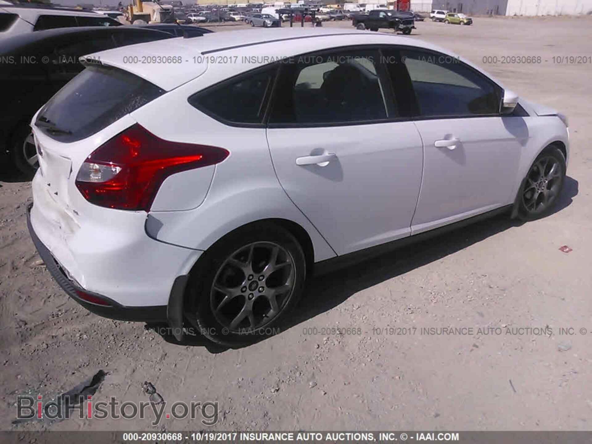 2014 Ford Focus - VIN: 1FADP3K29EL118315 - Photo 4