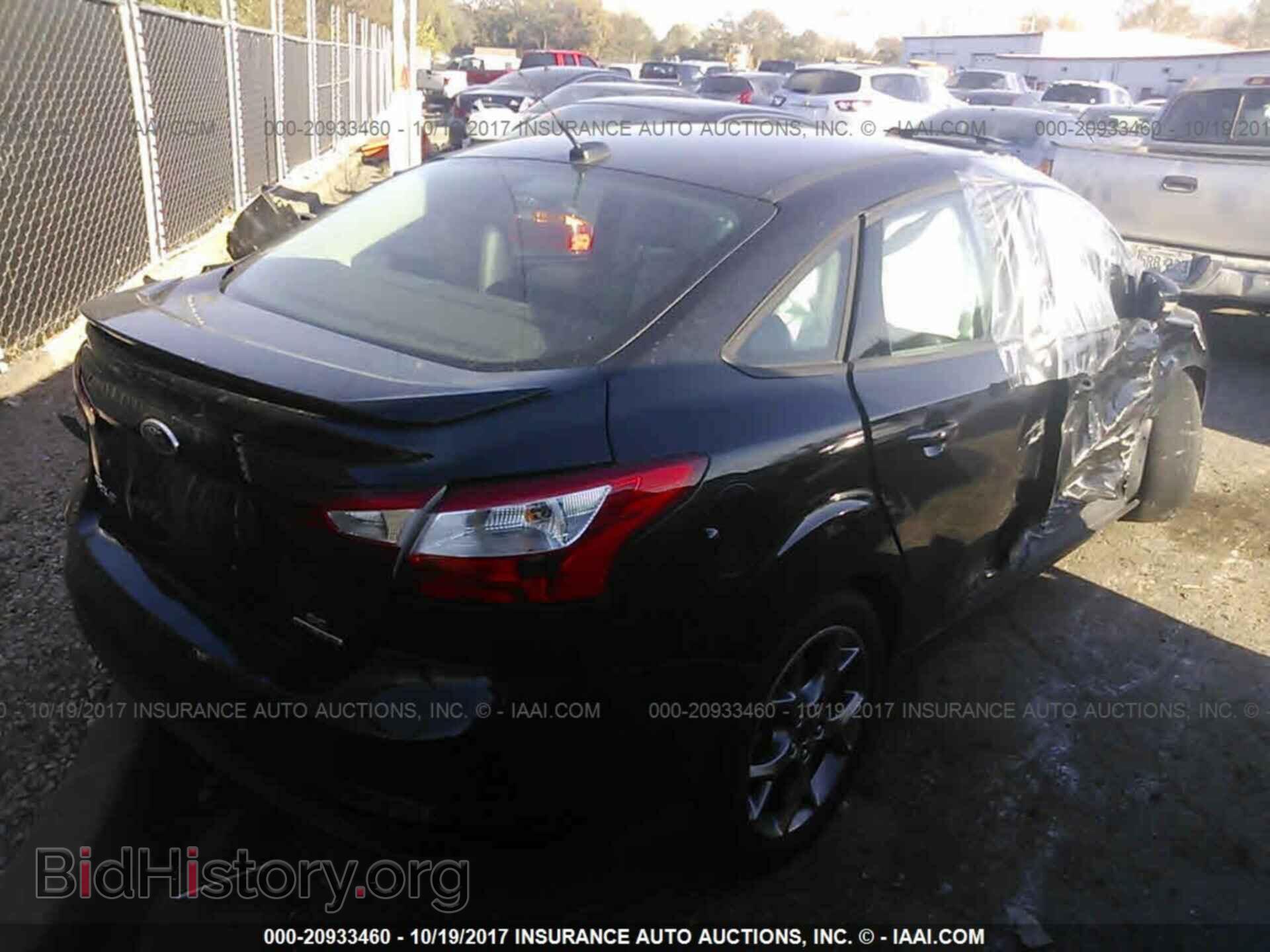 2014 Ford Focus - VIN: 1FADP3F22EL324490 - Photo 4