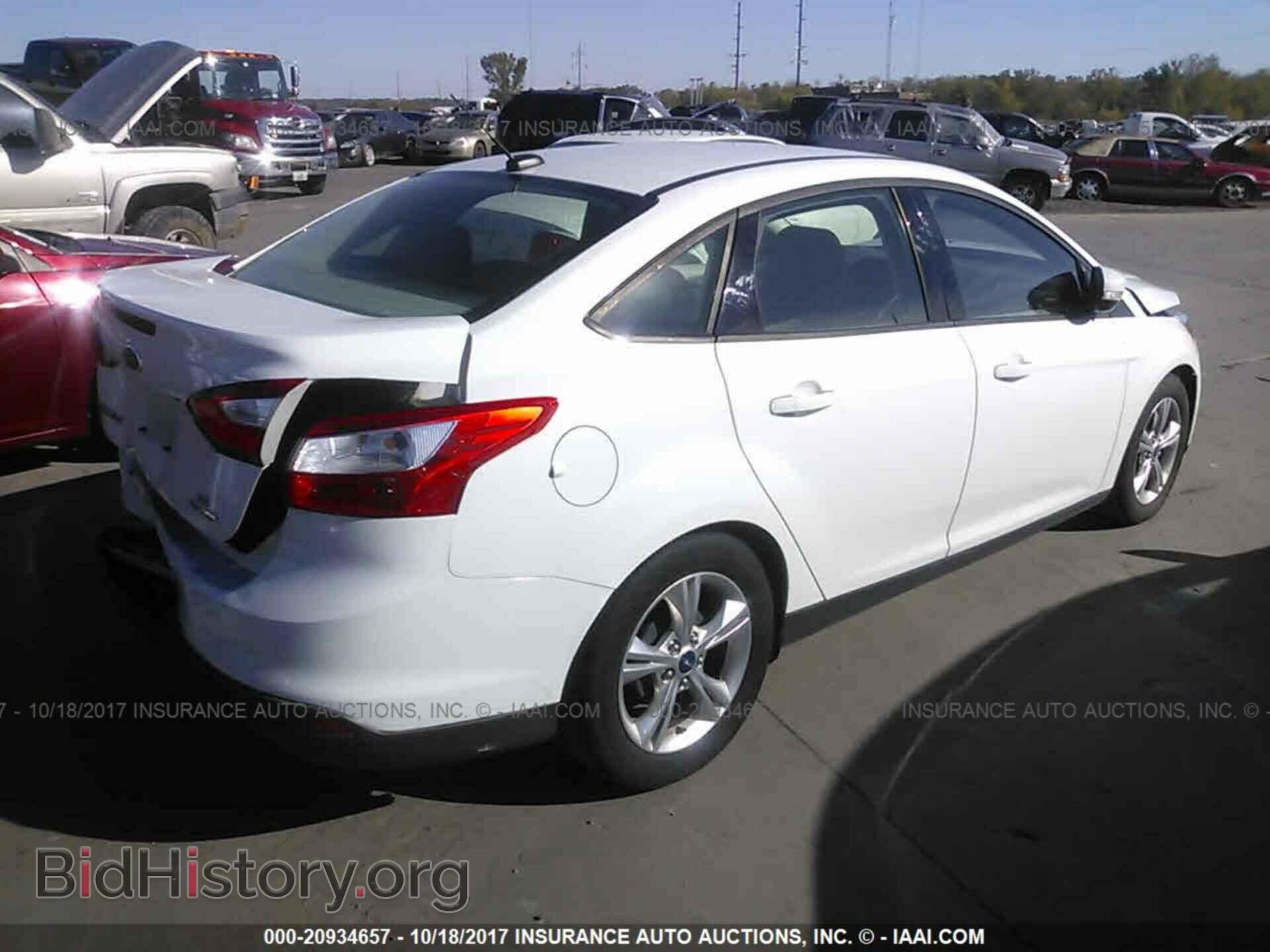 2014 Ford Focus - VIN: 1FADP3F28EL138114 - Photo 4