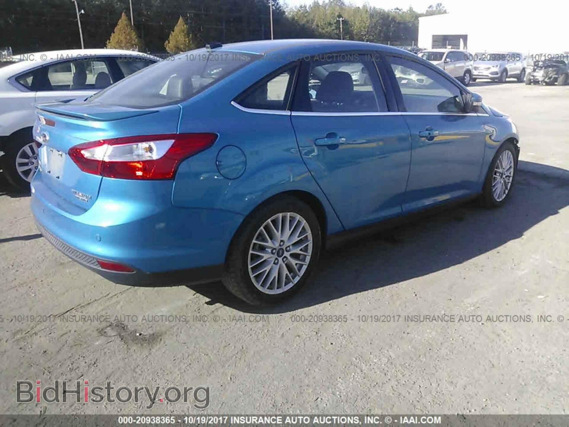 2014 Ford Focus - VIN: 1FADP3J29EL435982 - Photo 4