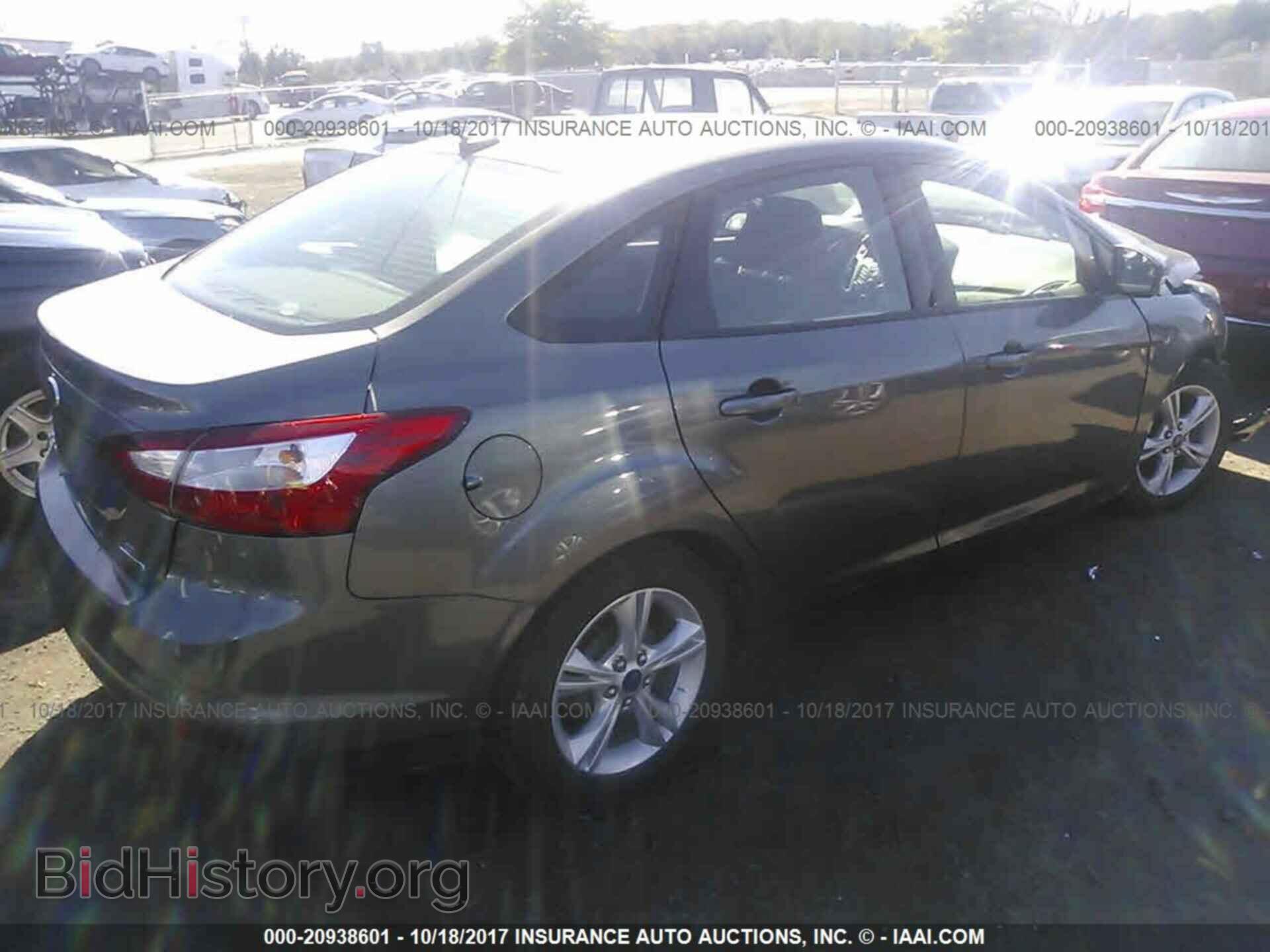 2014 Ford Focus - VIN: 1FADP3F29EL458588 - Фото 4