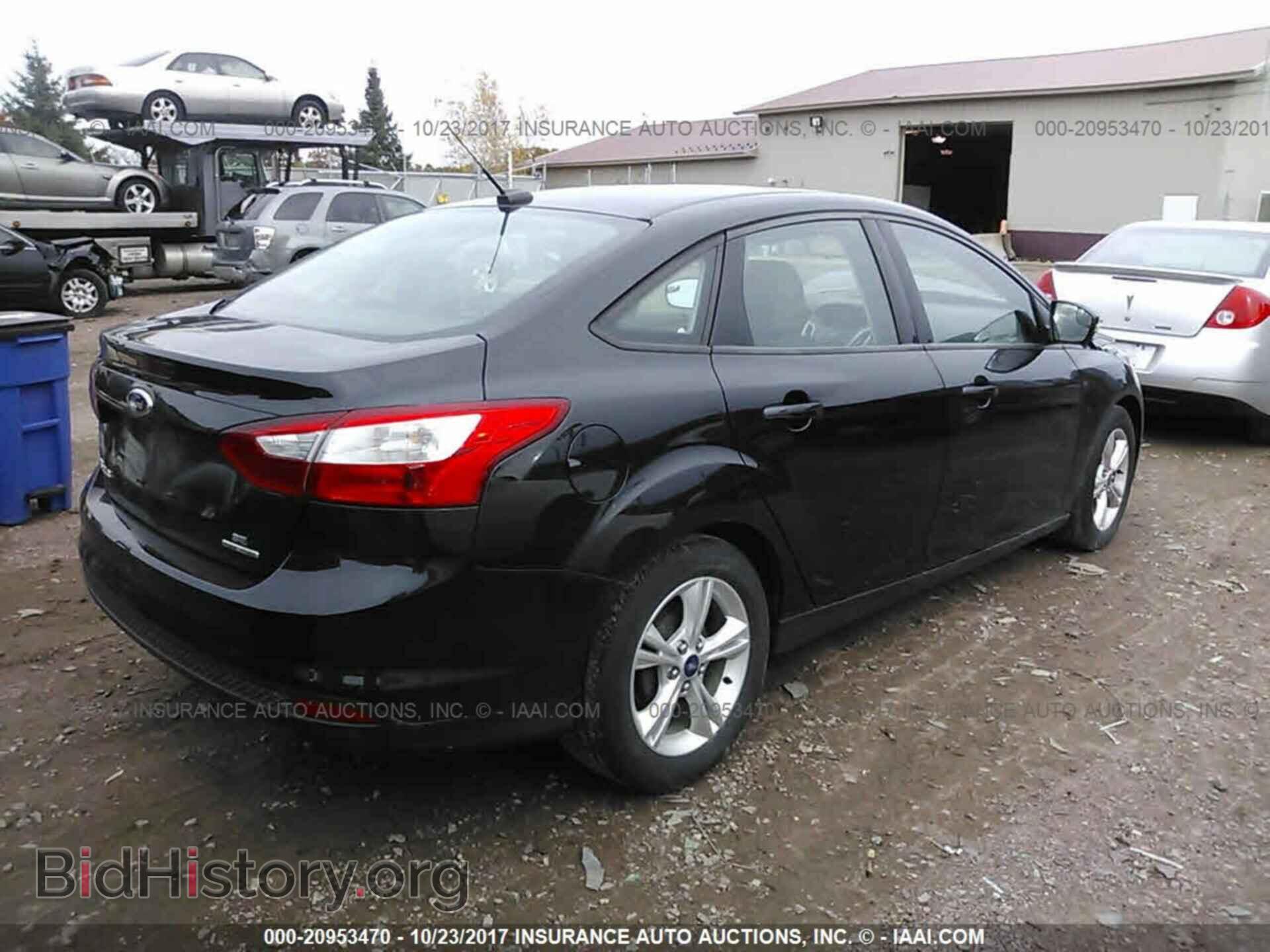 2014 Ford Focus - VIN: 1FADP3F23EL207341 - Photo 4