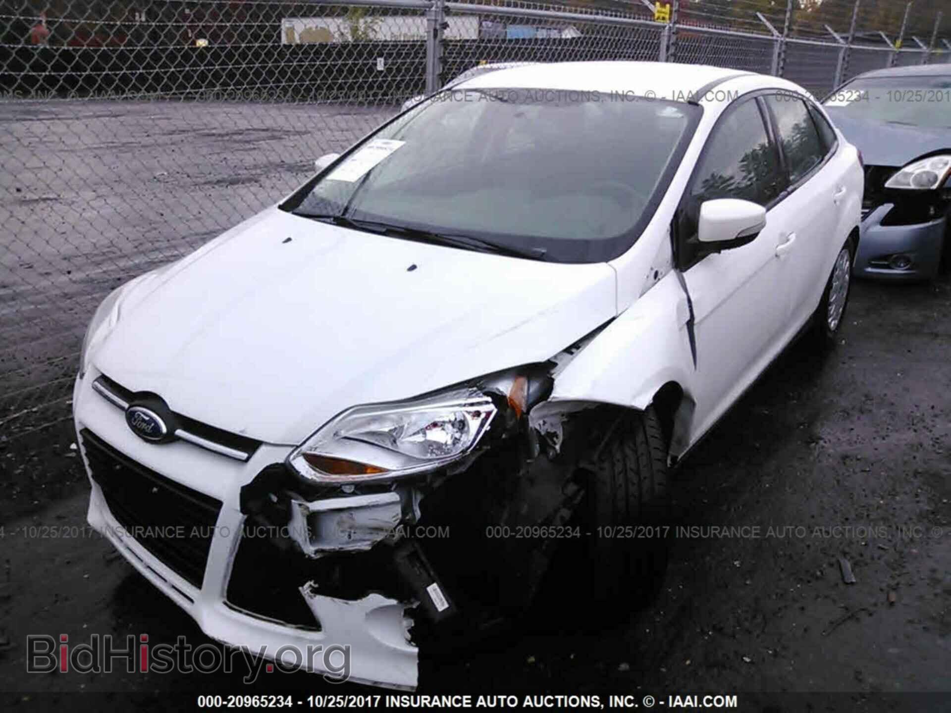 2014 Ford Focus - VIN: 1FADP3F21EL178258 - Photo 2