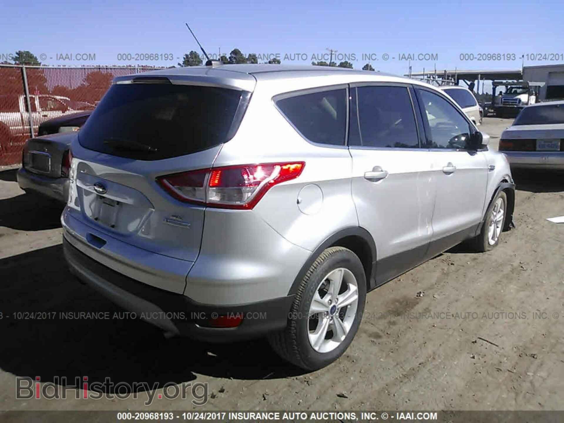 2014 Ford Escape - VIN: 1FMCU0GX9EUB00517 - Фото 4
