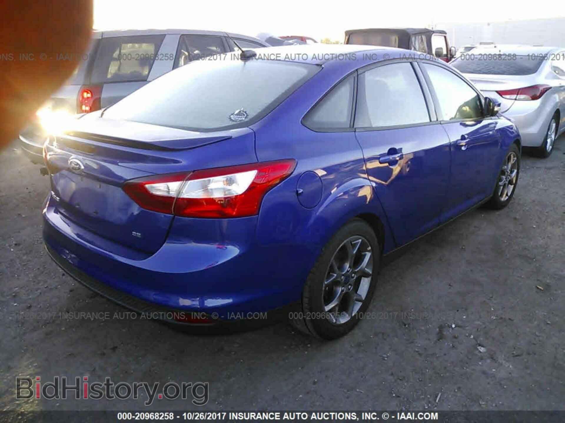2014 Ford Focus - VIN: 1FADP3F27EL455981 - Photo 4
