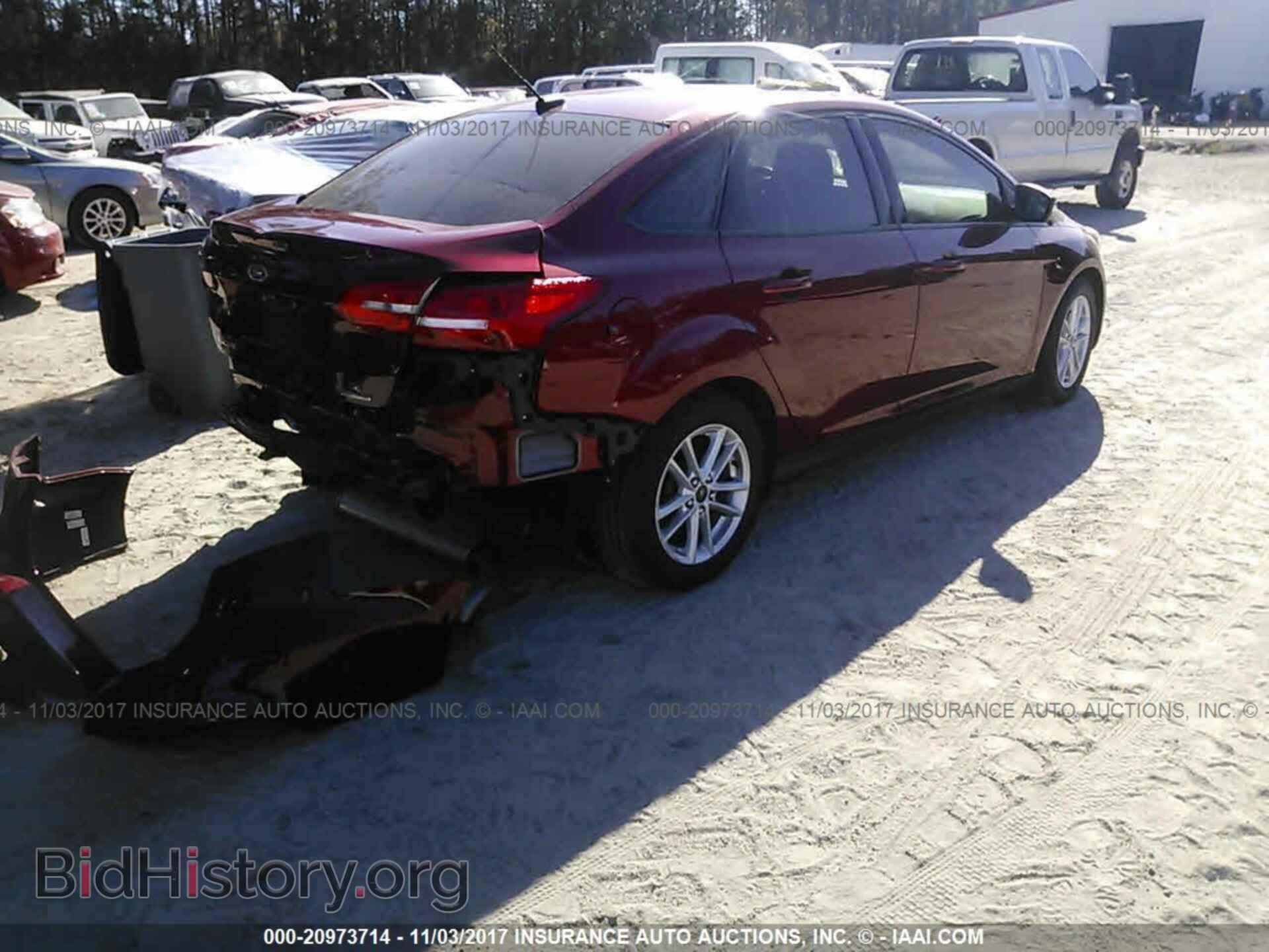 2016 Ford Focus - VIN: 1FADP3F2XGL393611 - Фото 4