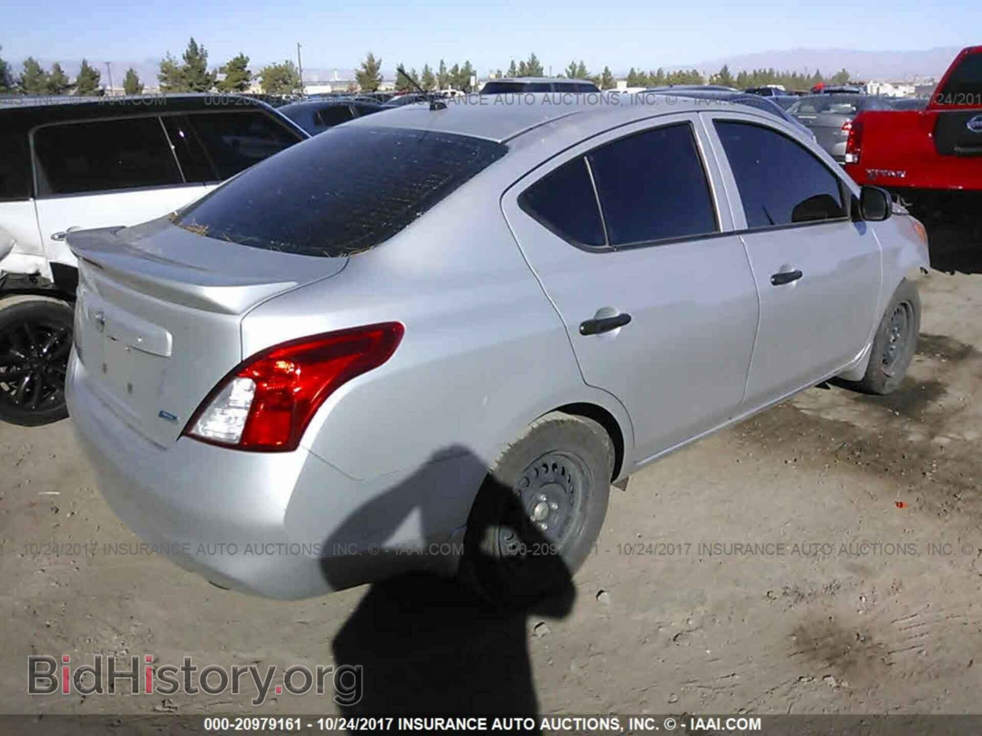 2014 Nissan Versa - VIN: 3N1CN7AP9EL821260 - Фото 4