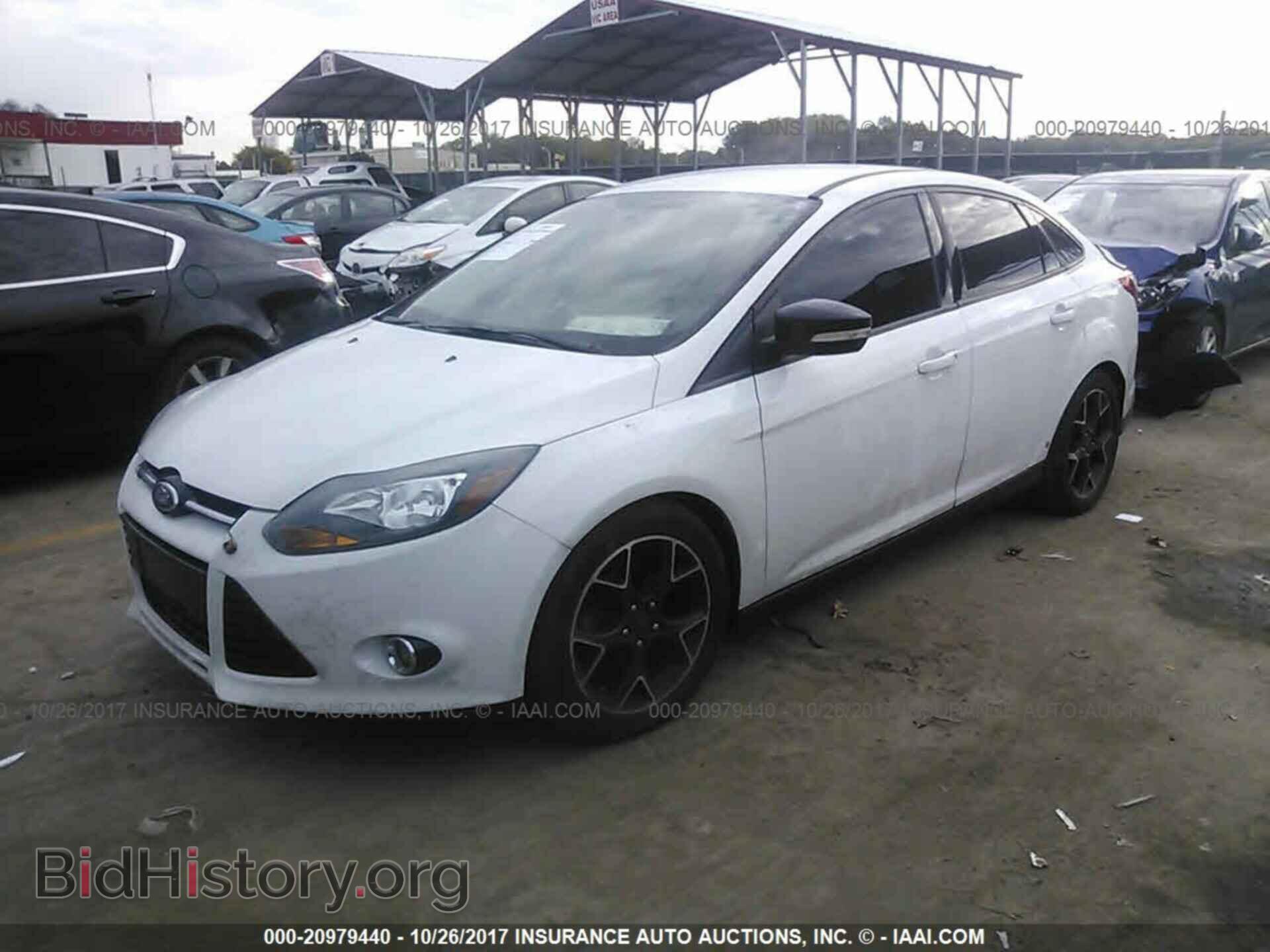 2014 Ford Focus - VIN: 1FADP3F2XEL304813 - Photo 2