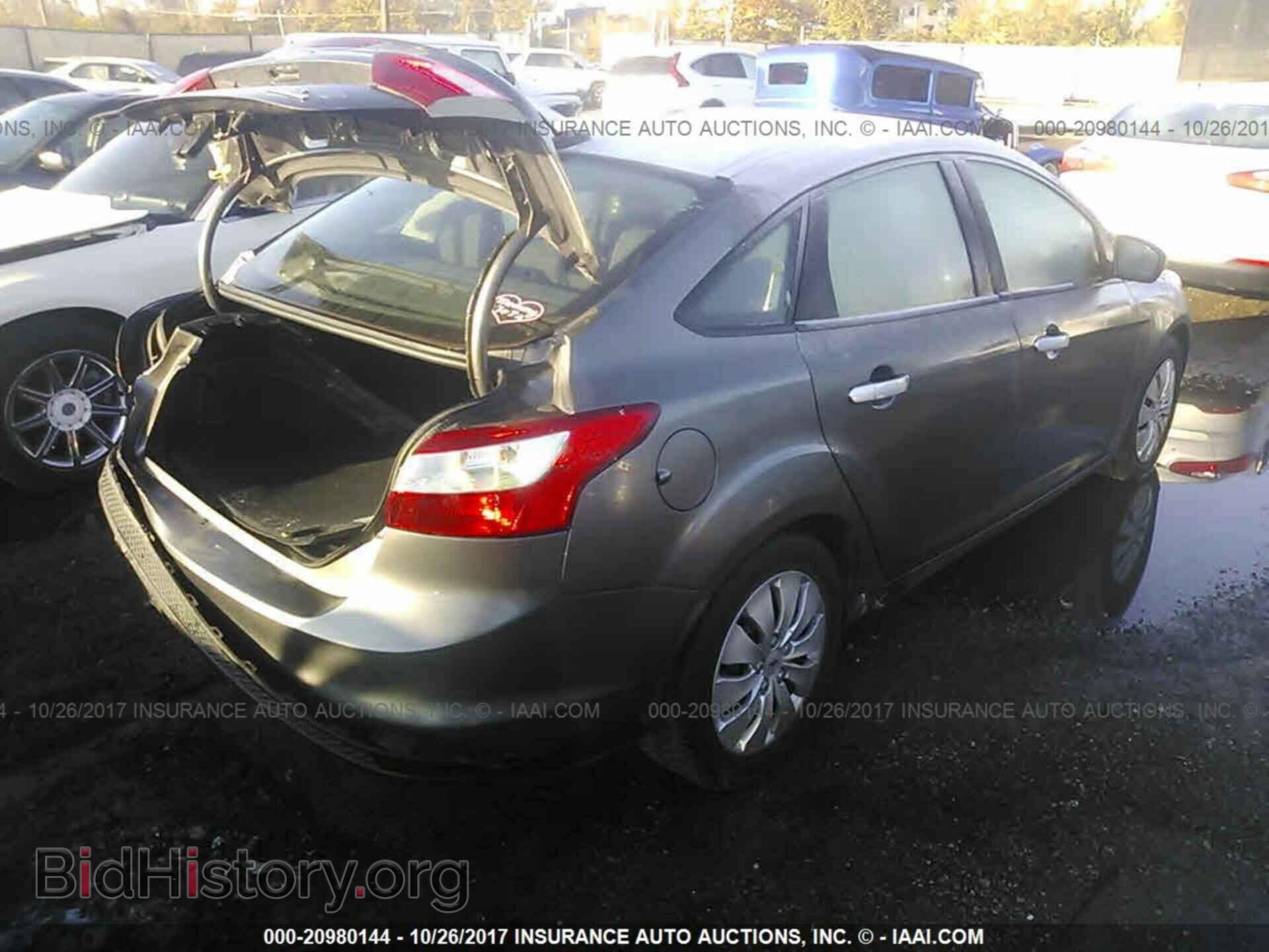 2012 Ford Focus - VIN: 1FAHP3F22CL399897 - Фото 4