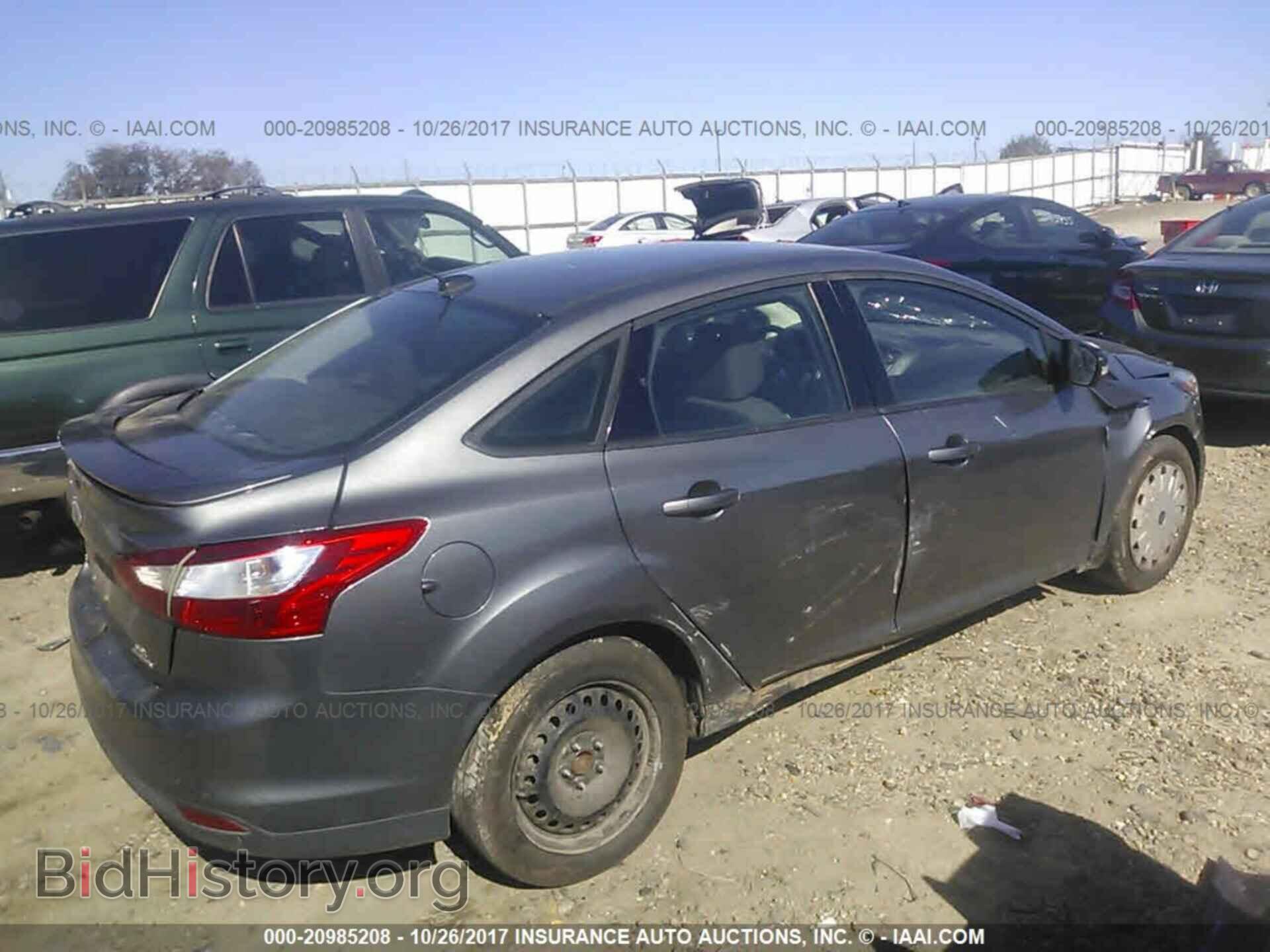 2013 Ford Focus - VIN: 1FADP3F29DL104150 - Фото 4