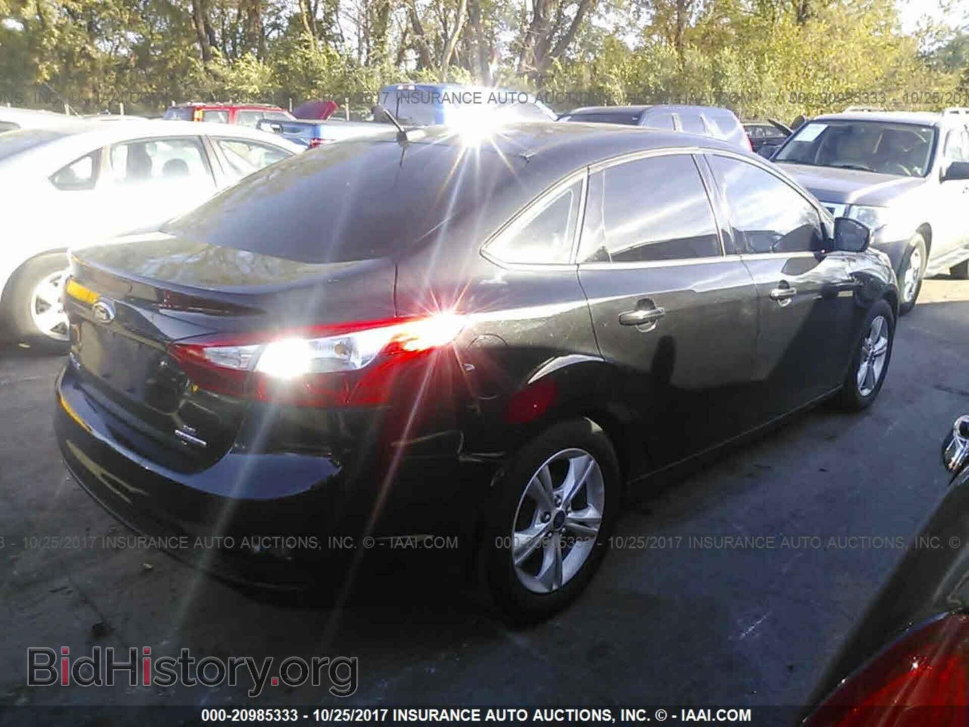 2014 Ford Focus - VIN: 1FADP3F29EL224077 - Фото 4